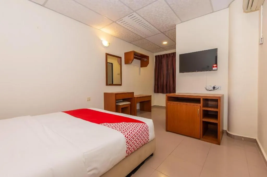 Bed in OYO 90893 Hotel 68 Kampung Lapan