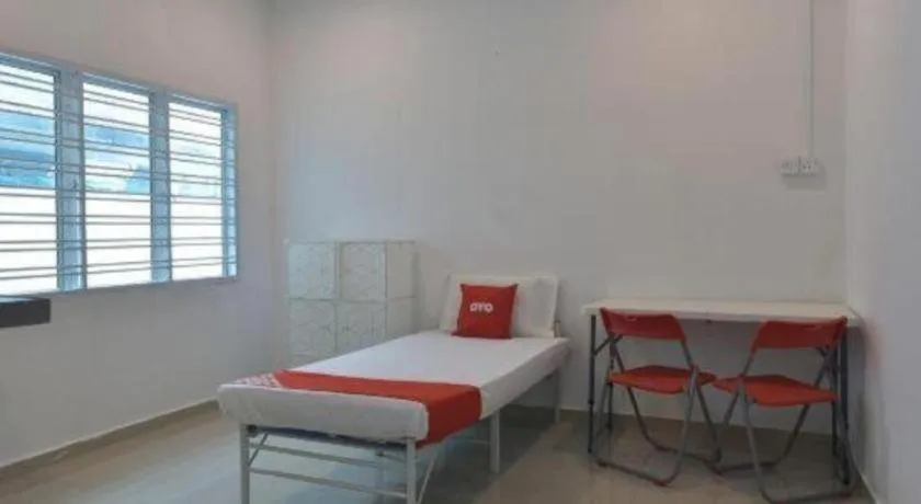 Bed in OYO 90889 Narasindo Cottage