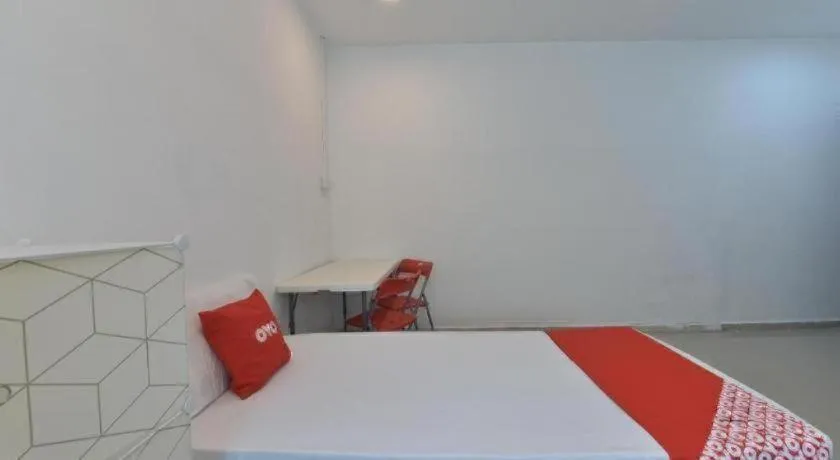 Bed in OYO 90889 Narasindo Cottage