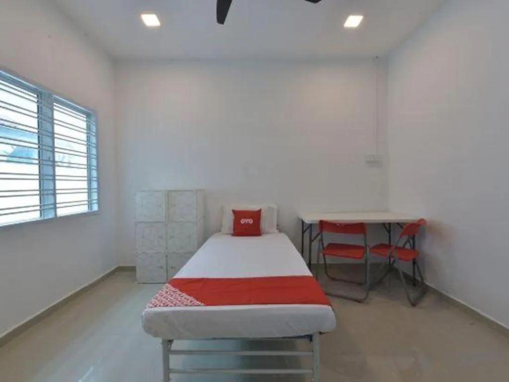 Bed in OYO 90889 Narasindo Cottage