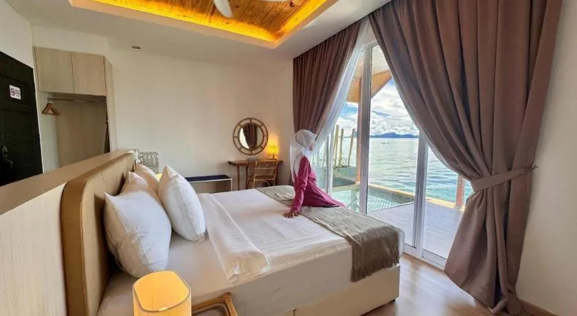 Bed in Sand Bay Resort Semporna