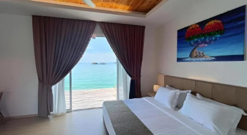 Bed in Sand Bay Resort Semporna