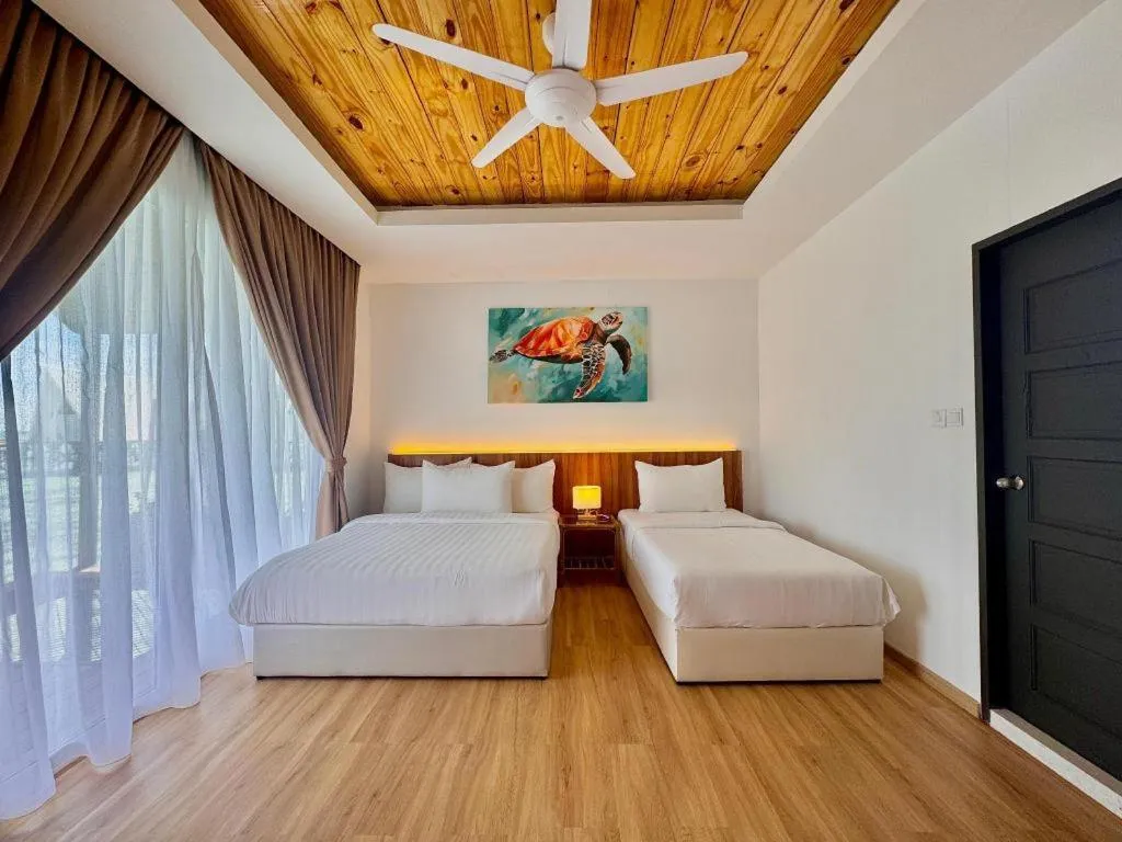 Bed in Sand Bay Resort Semporna