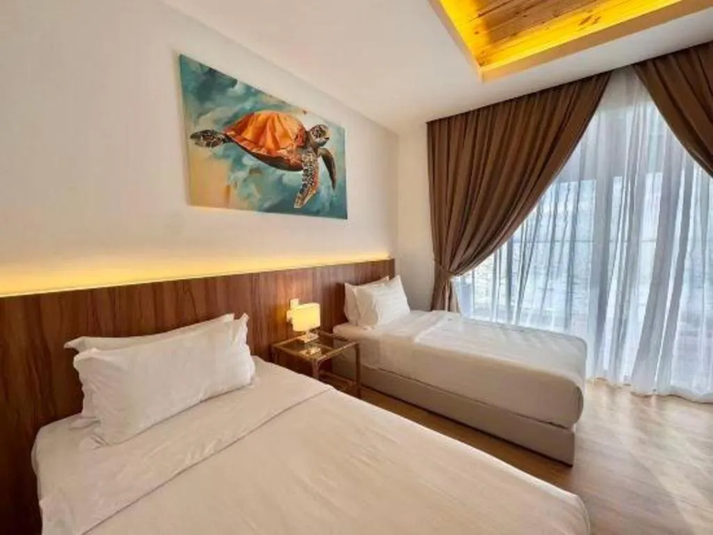 Bed in Sand Bay Resort Semporna