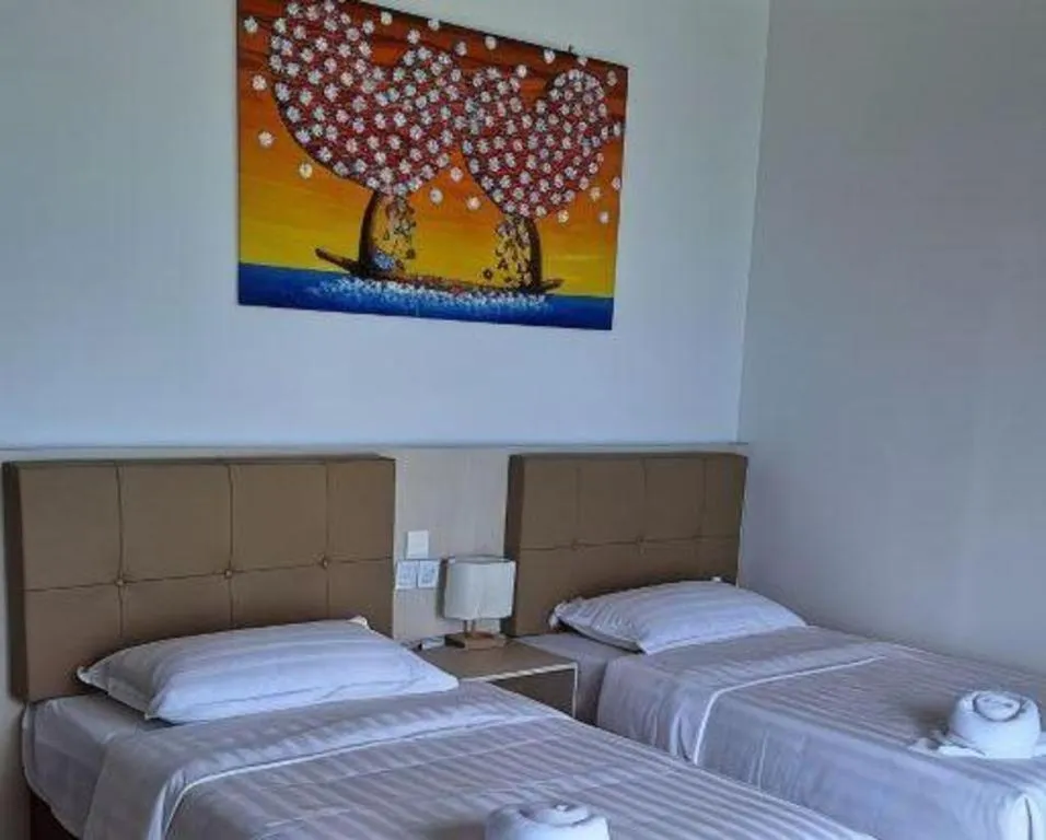 Bed in Sand Bay Resort Semporna