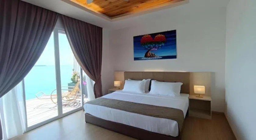 Bed in Sand Bay Resort Semporna