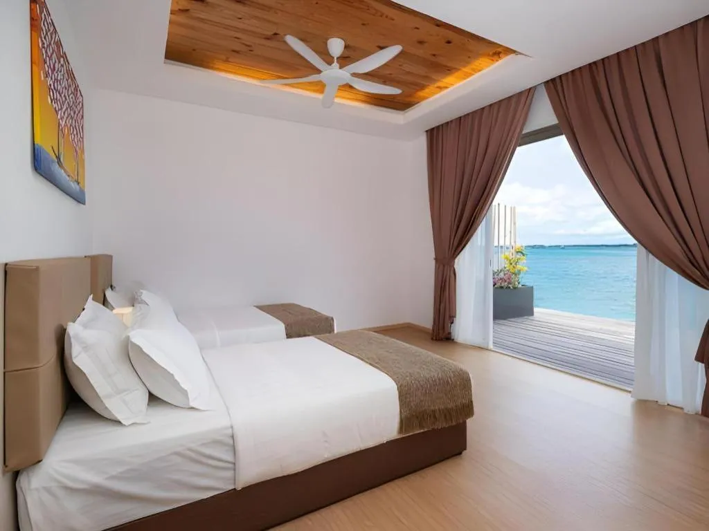 Bed in Sand Bay Resort Semporna