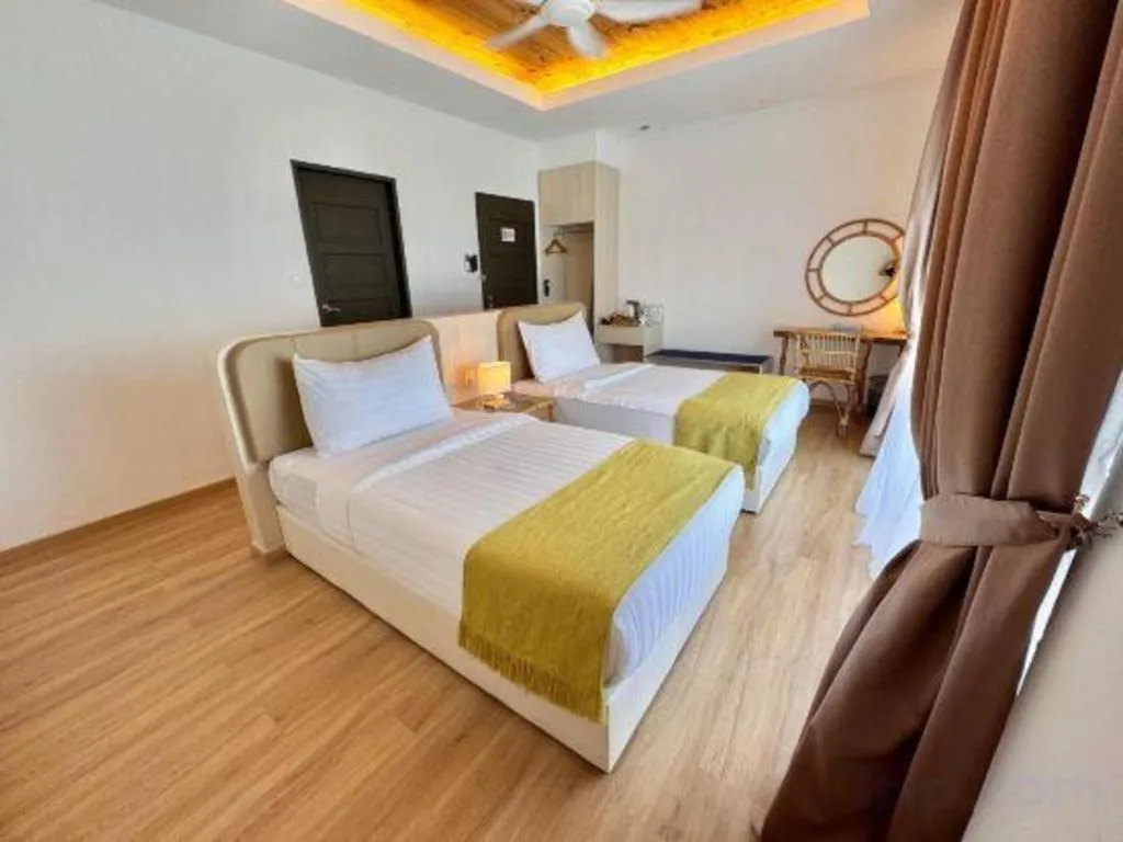 Bed in Sand Bay Resort Semporna