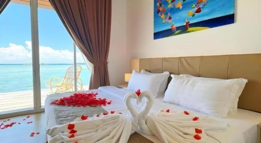 Bed in Sand Bay Resort Semporna