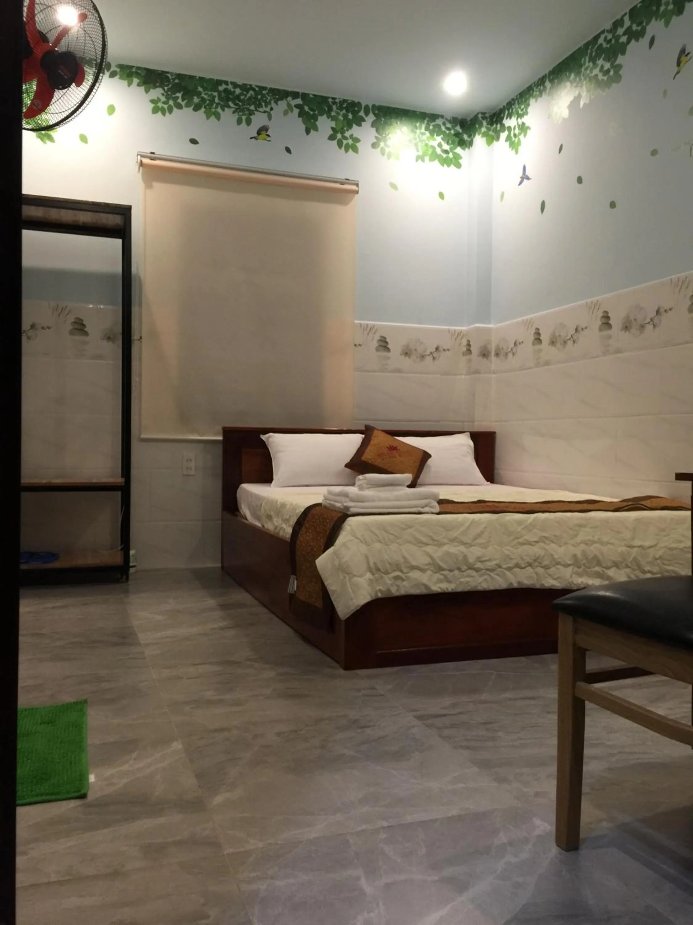 Photo of the whole room, Bed in Ngan Giang Guesthouse