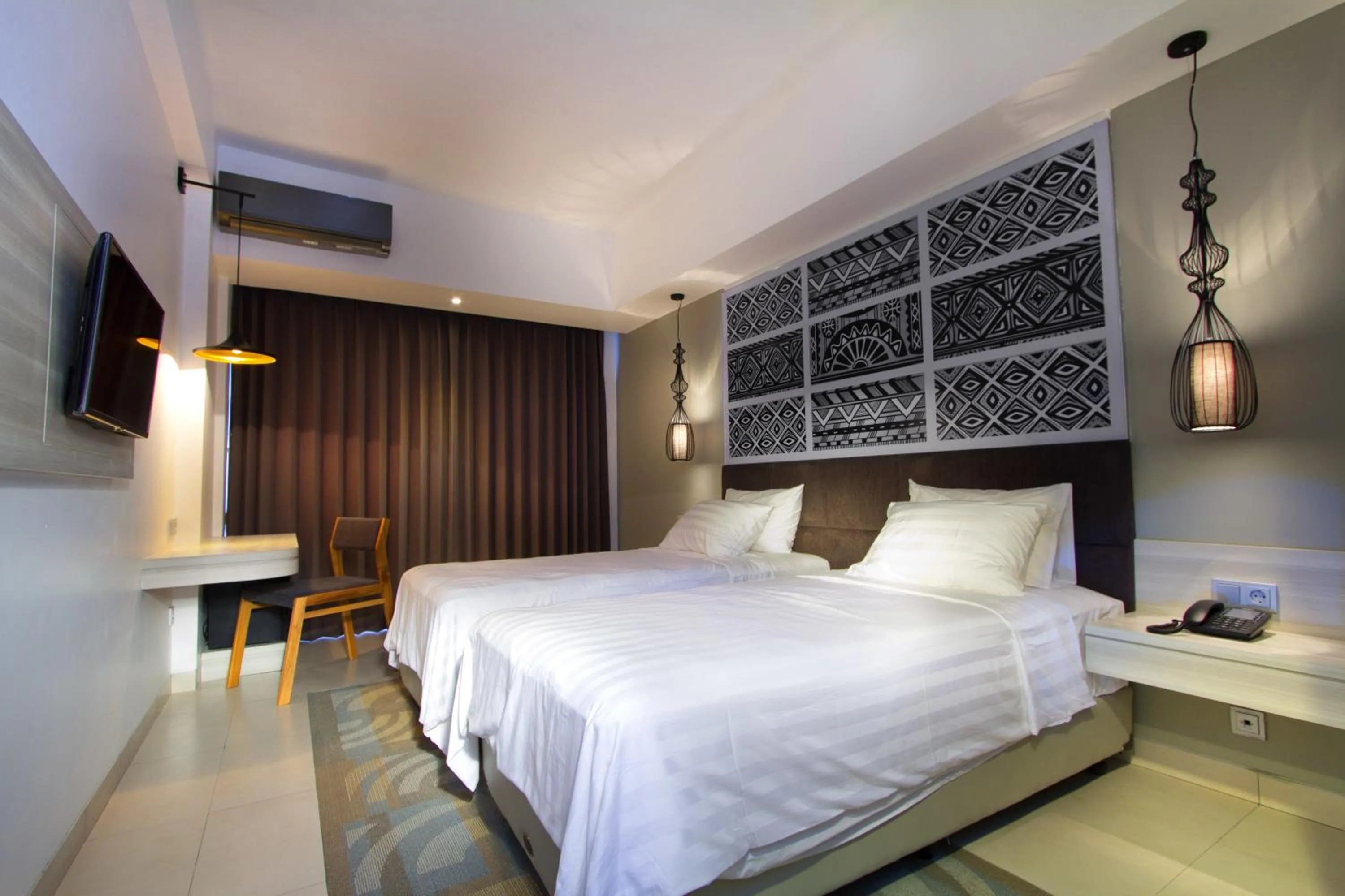 Photo of the whole room, Bed in Aston Anyer Beach Hotel