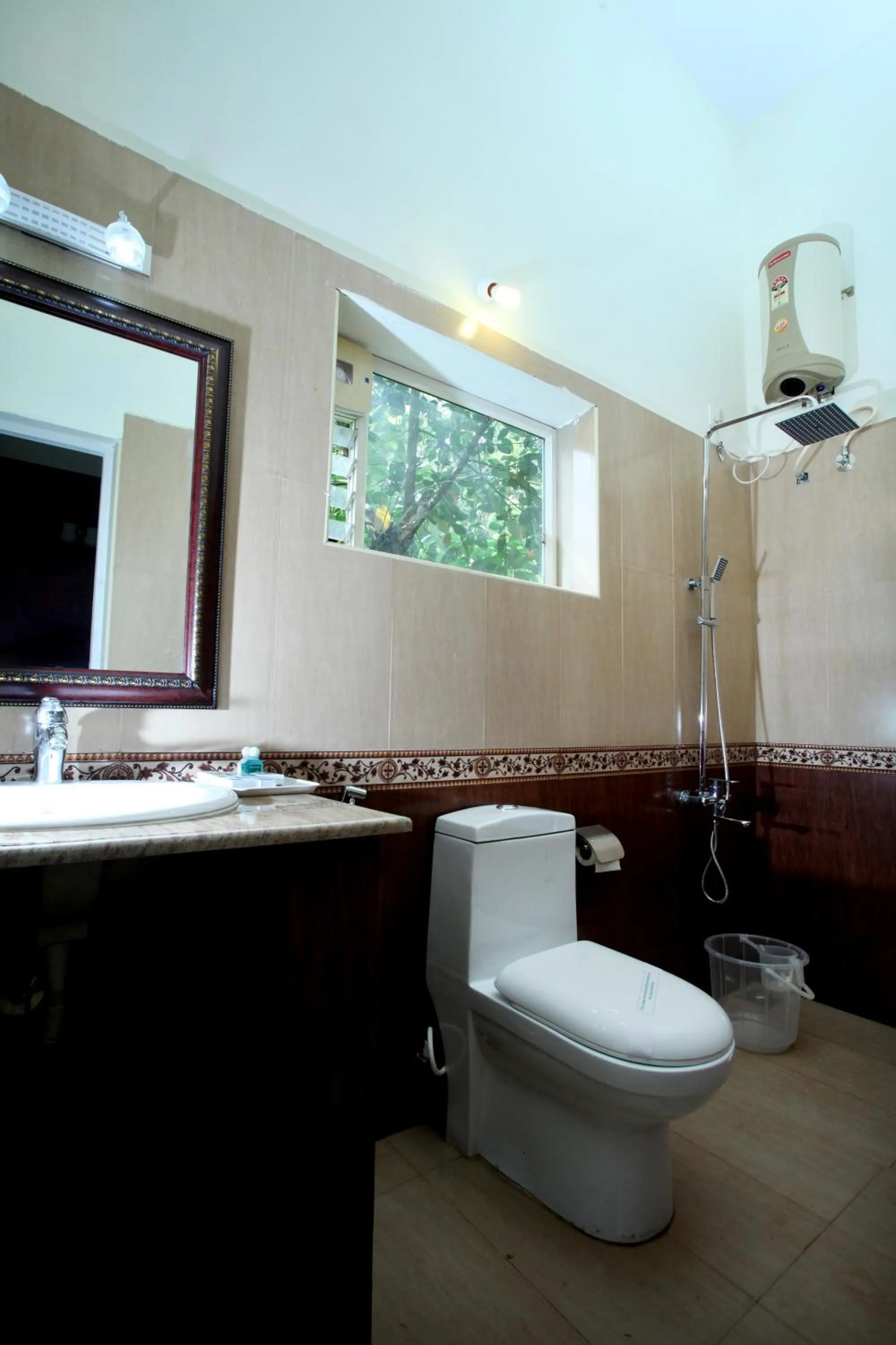 Bathroom in Lakkidi Village Resort Wayanad