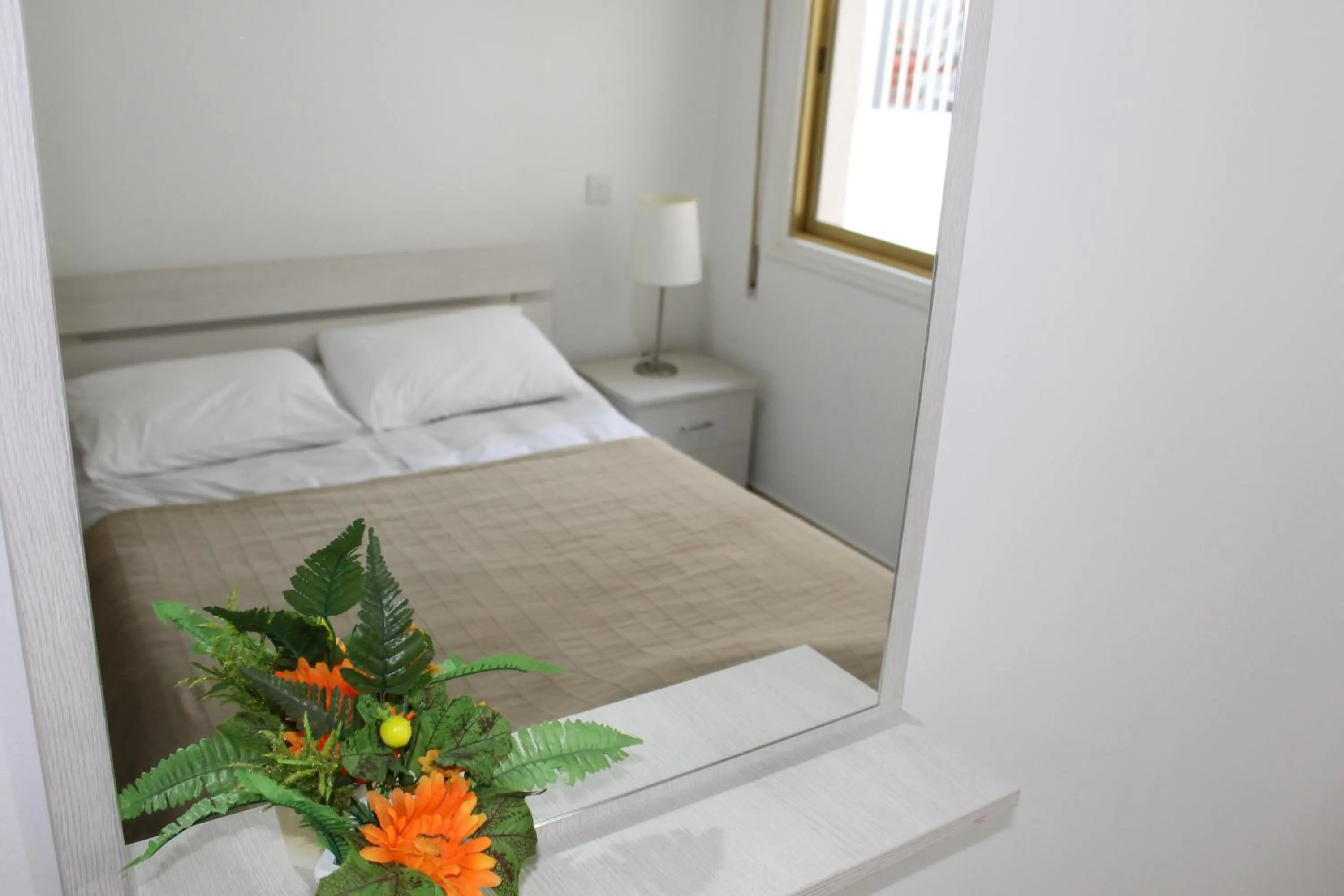 Bed in Tiffany City Apartments