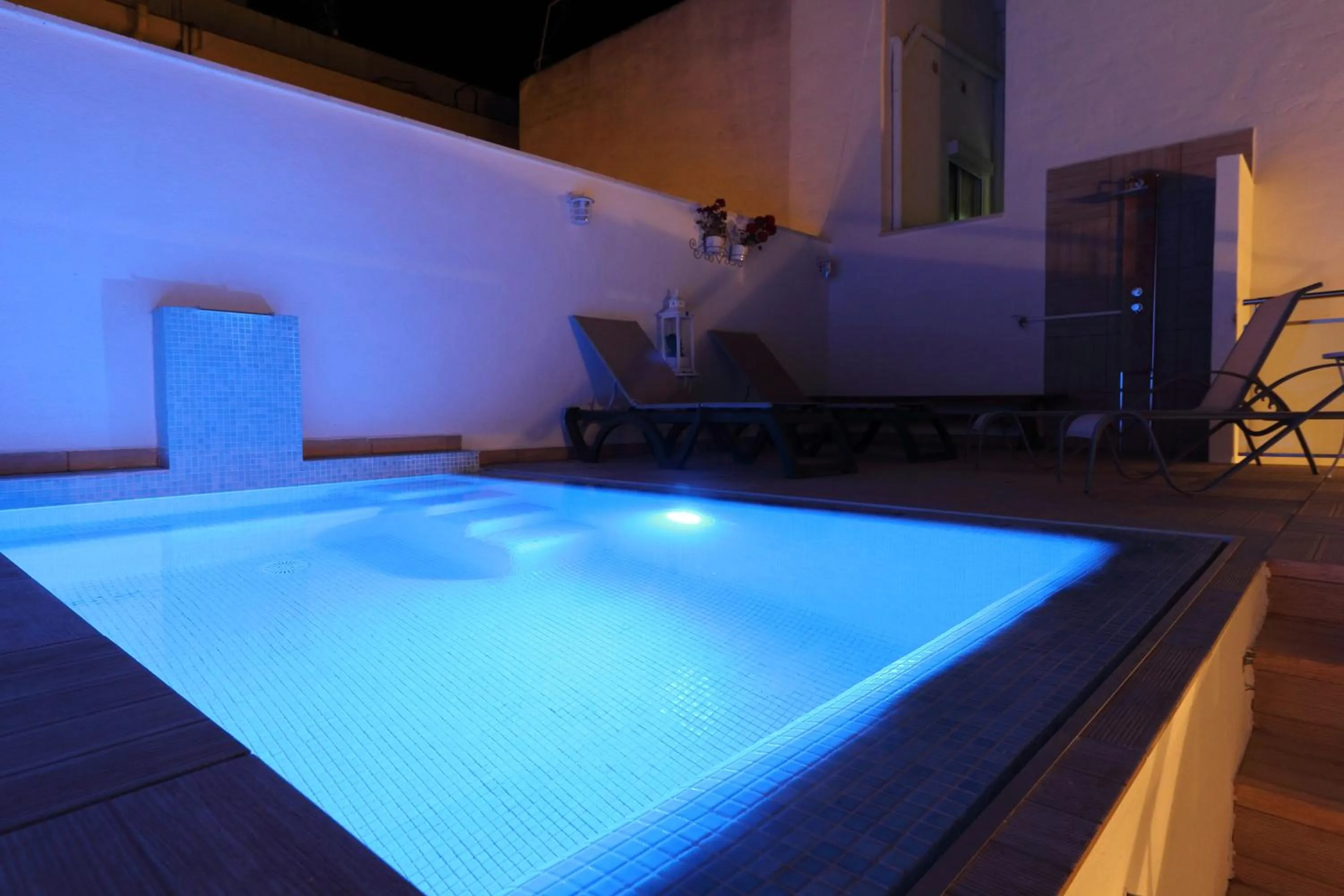 Swimming pool in Sitges Centre Mediterranean House- 5 Bedroom, 4 Bathroom, Terrace Courtyard, Private Rooptop Pool
