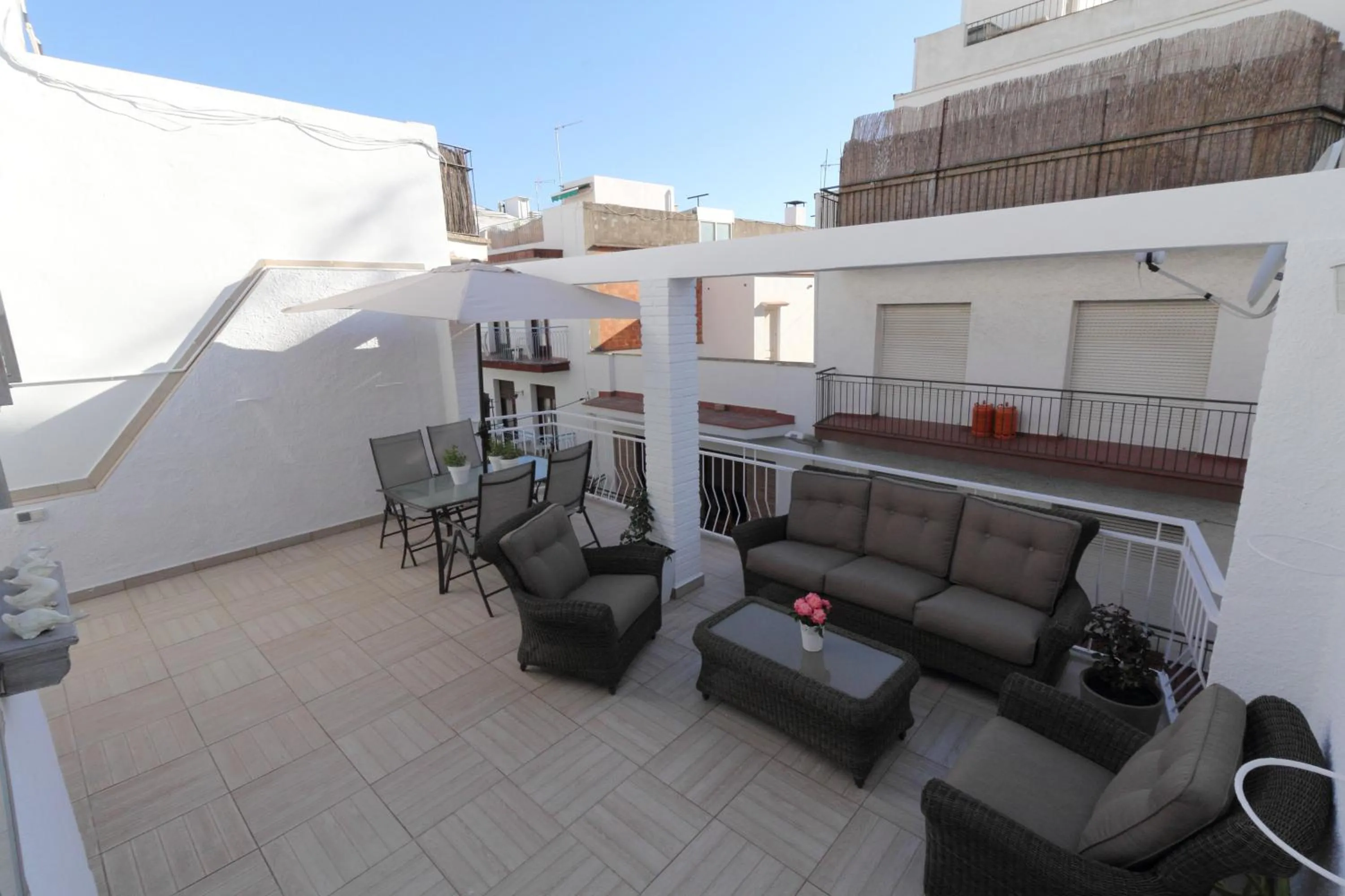 Patio in Sitges Centre Mediterranean House- 5 Bedroom, 4 Bathroom, Terrace Courtyard, Private Rooptop Pool