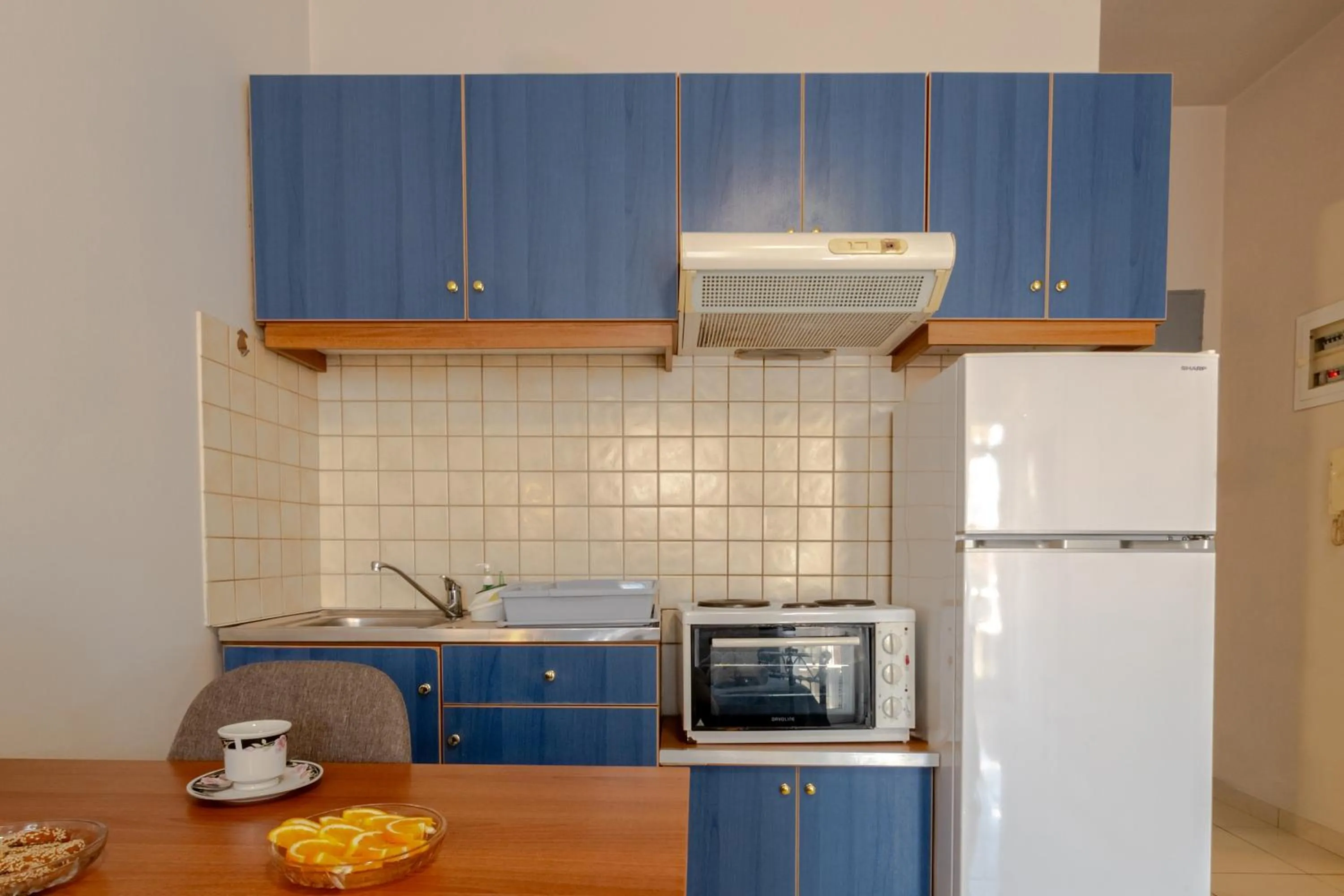 Kitchen or kitchenette in Alena Apartments