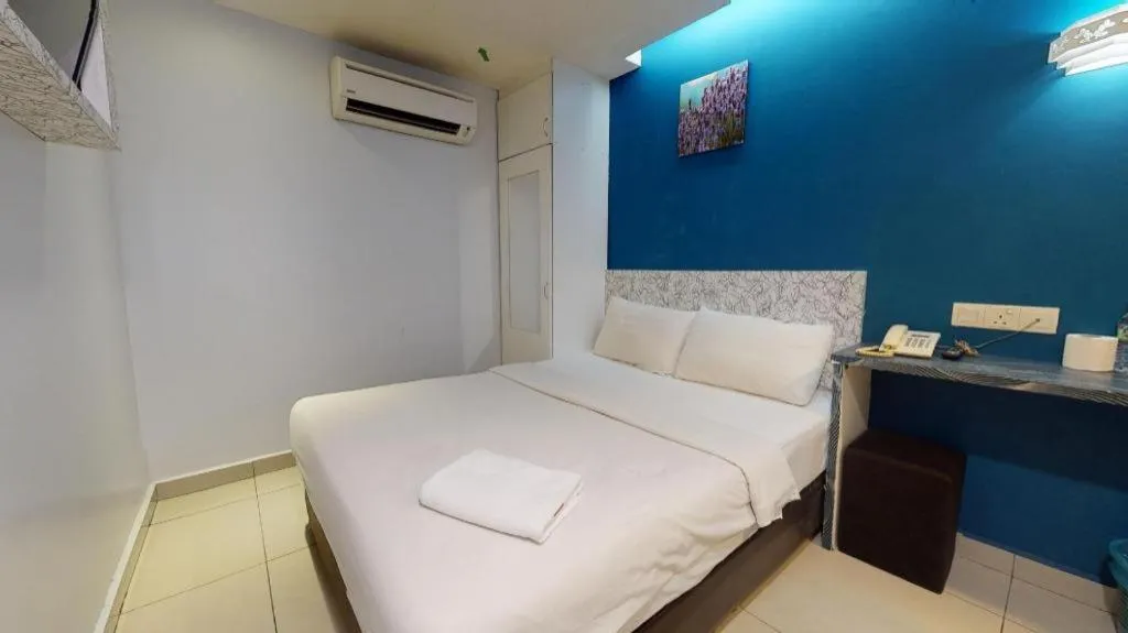 Bed in BLUEMOON BOUTIQUE HOTEL