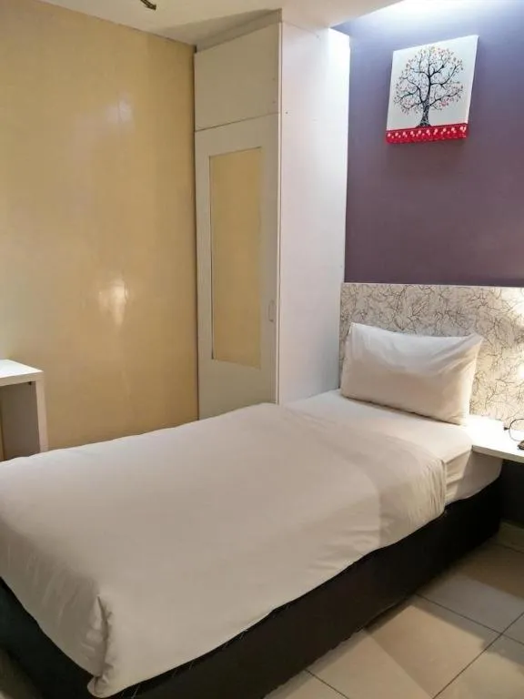 Bed in BLUEMOON BOUTIQUE HOTEL