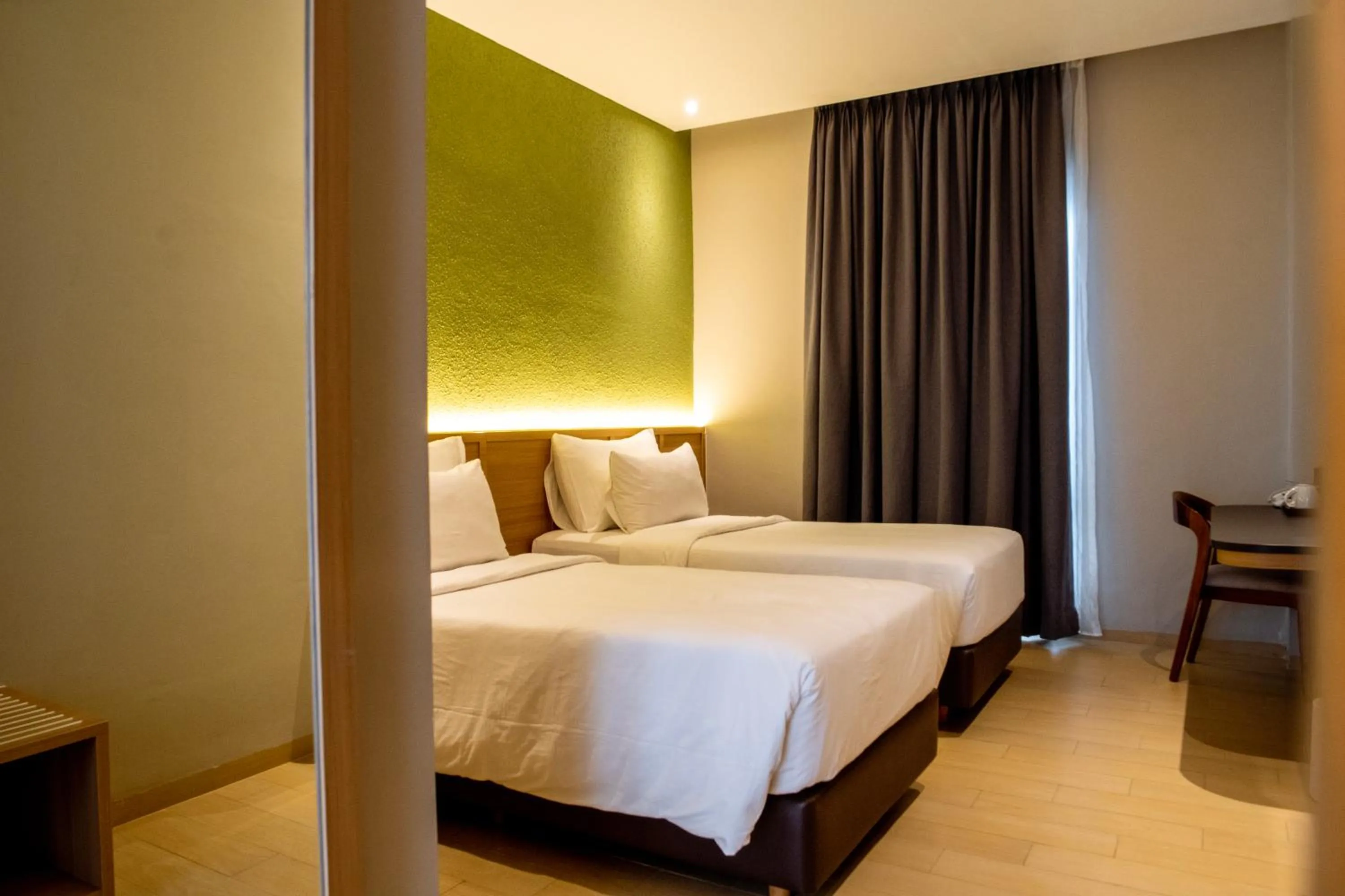 Bed in Khas Palu Hotel