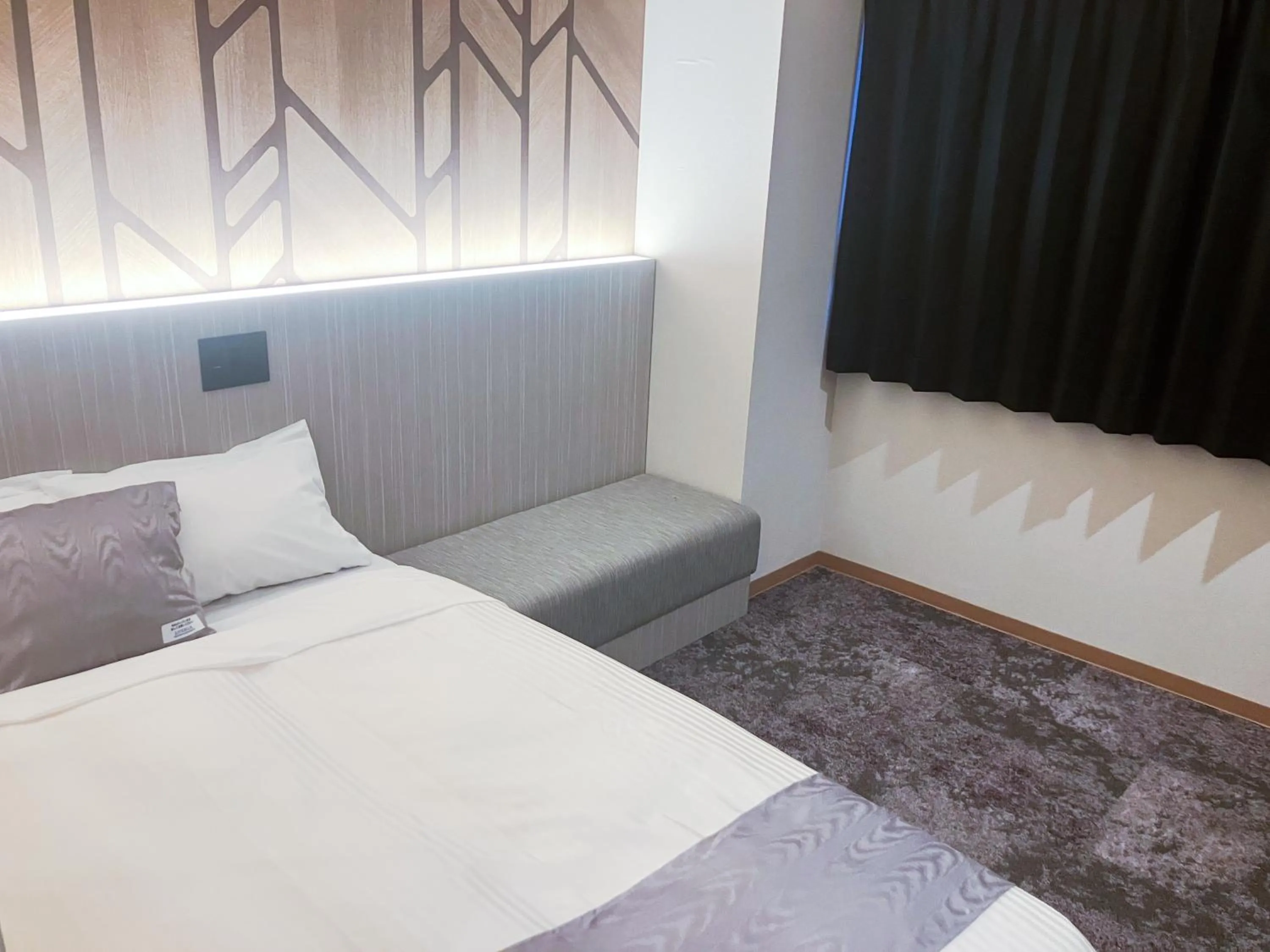 Photo of the whole room, Bed in HOTEL LiVEMAX Honhachinohe Ekimae