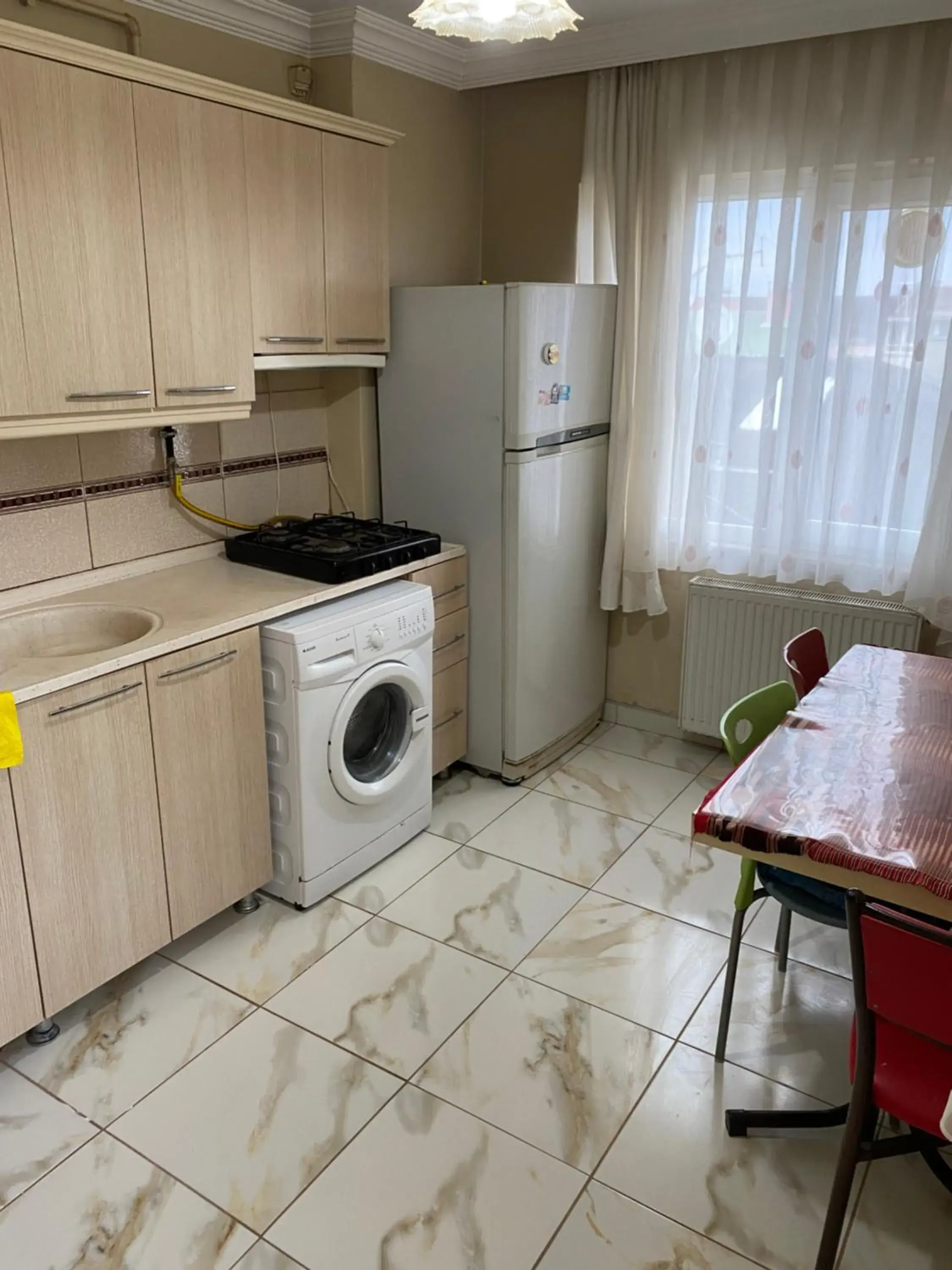 Three-Bedroom Apartment with Balcony (7 Adults) in Menekşe Apart 1 Three-Bedroom Apartment with Balcony (7 Adults) in Menekşe Apart 1