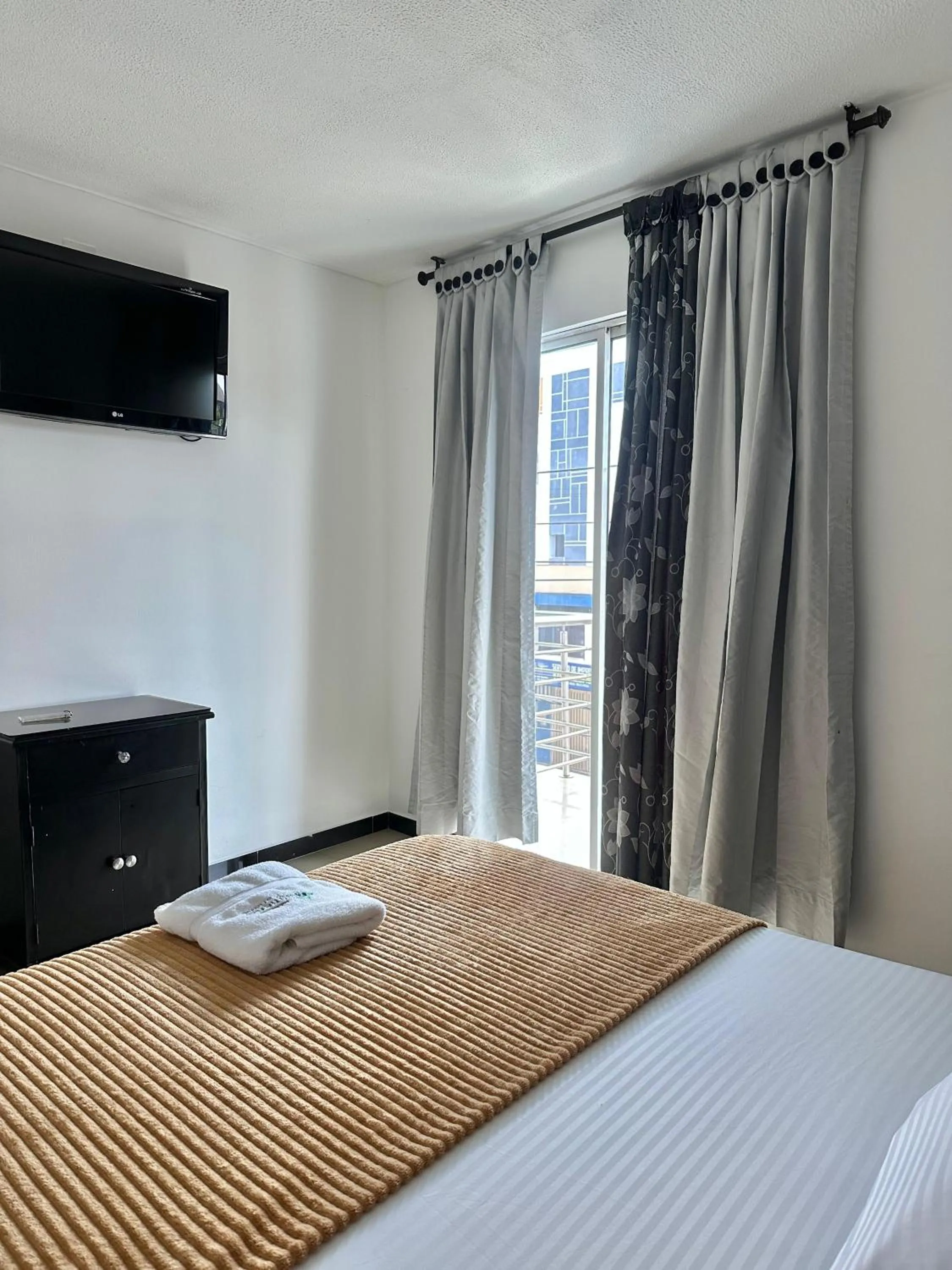 Bed in Hotel Palmeras De Mariana