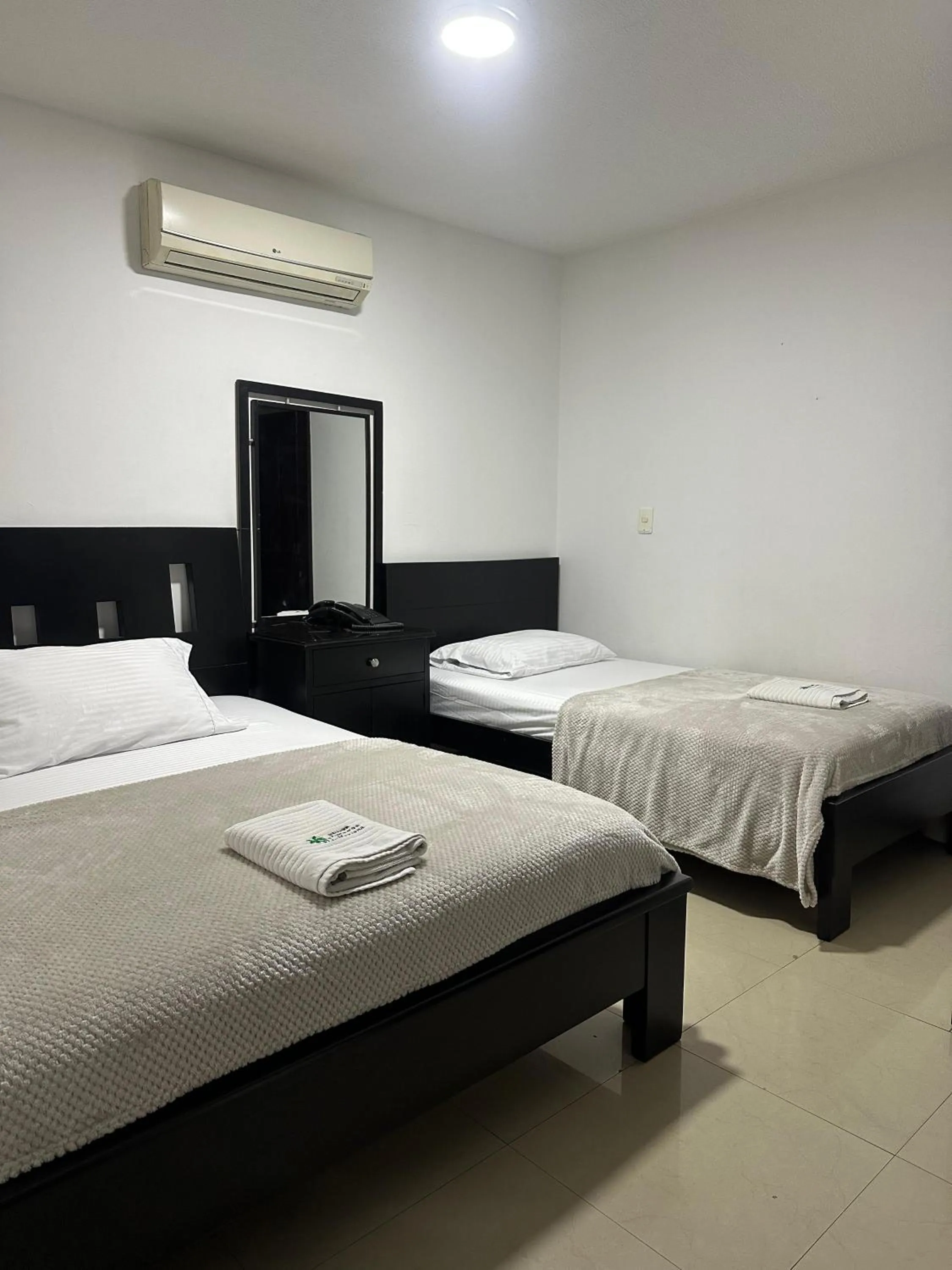 Bed in Hotel Palmeras De Mariana