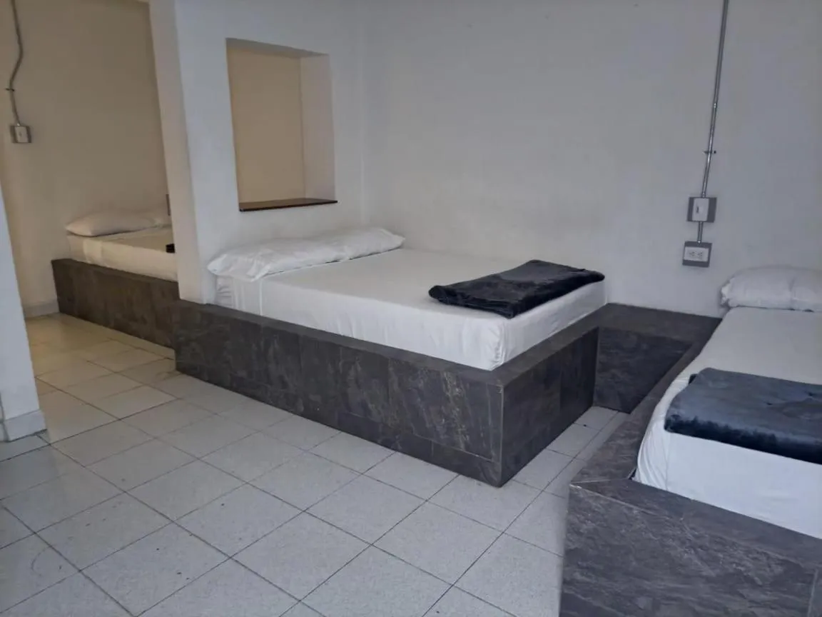 Bed in Hotel Villa Nueva Comfort