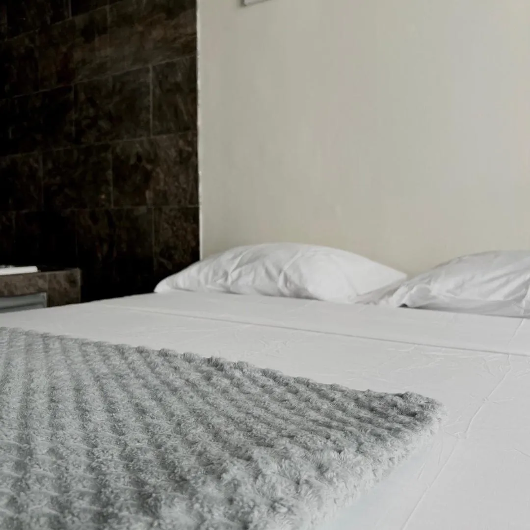 Bed in Hotel Villa Nueva Comfort