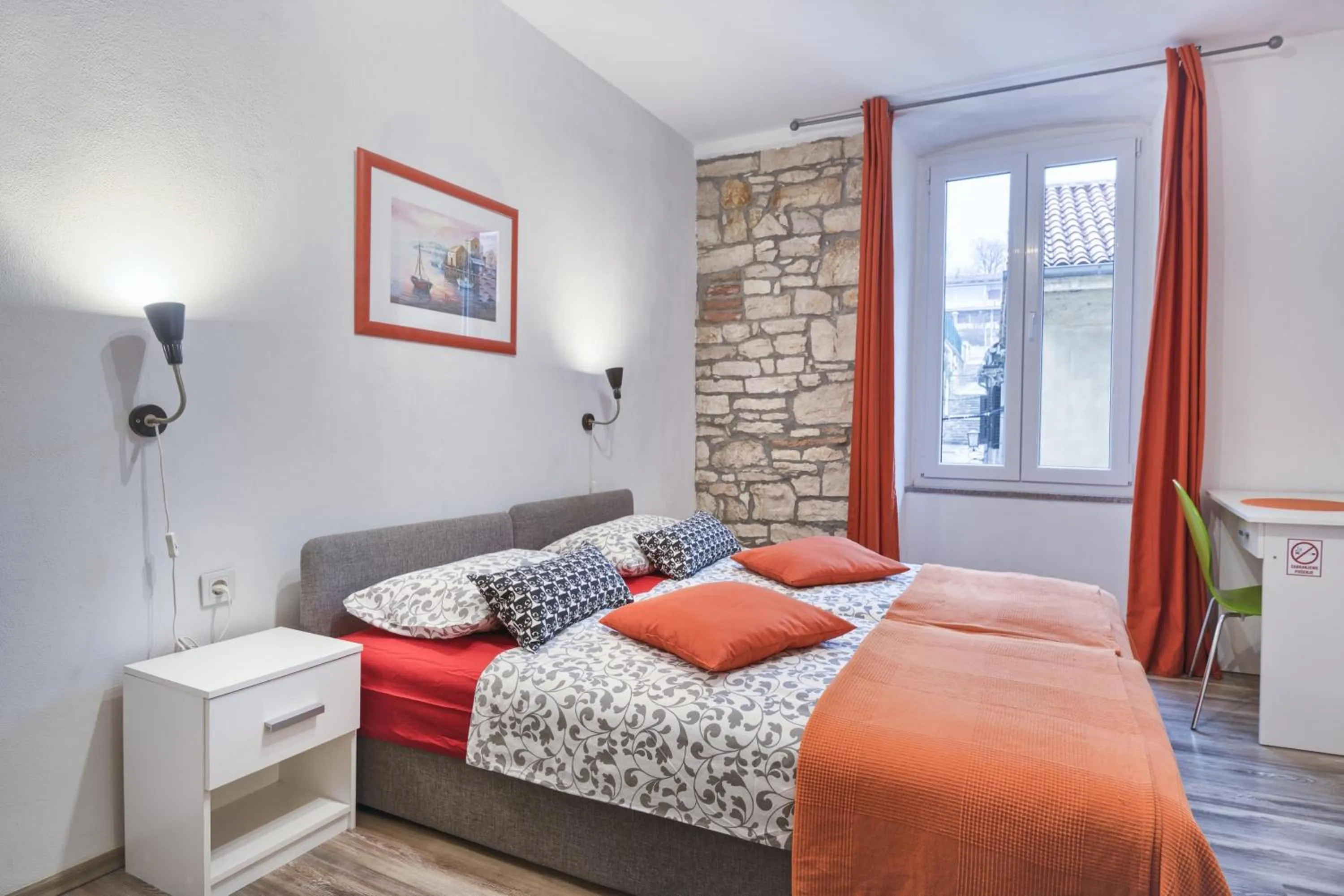 Photo of the whole room, Bed in Top Center Rooms & Studio