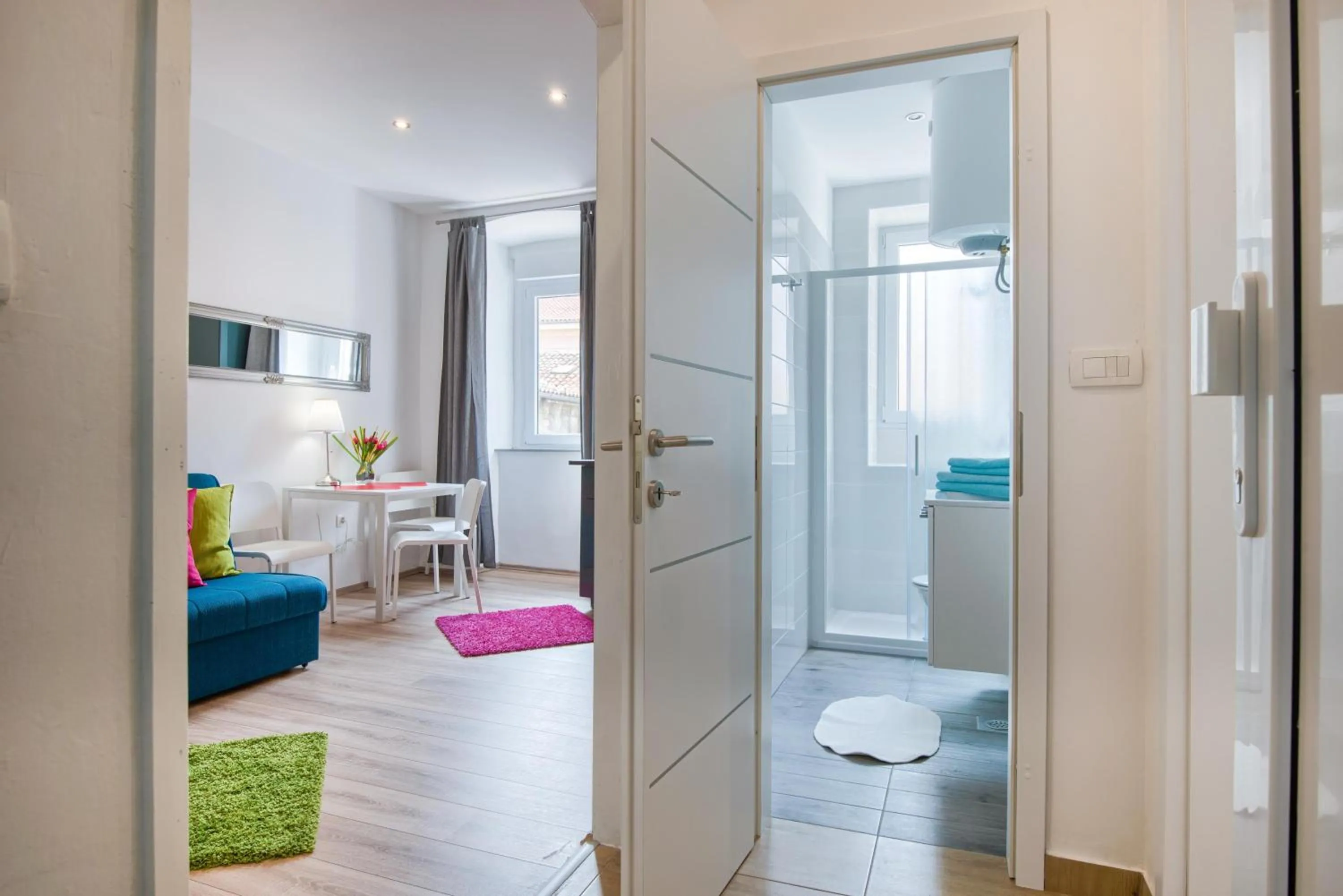 Photo of the whole room, Bed in Top Center Rooms & Studio