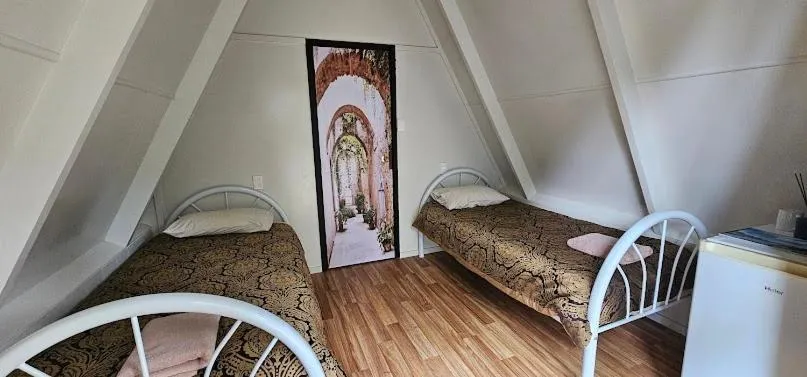 Bed in Westport Kiwi Holiday Park & Motels