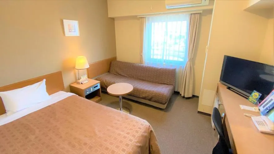 Bed in Ryugasaki Plaza Hotel Shinkan