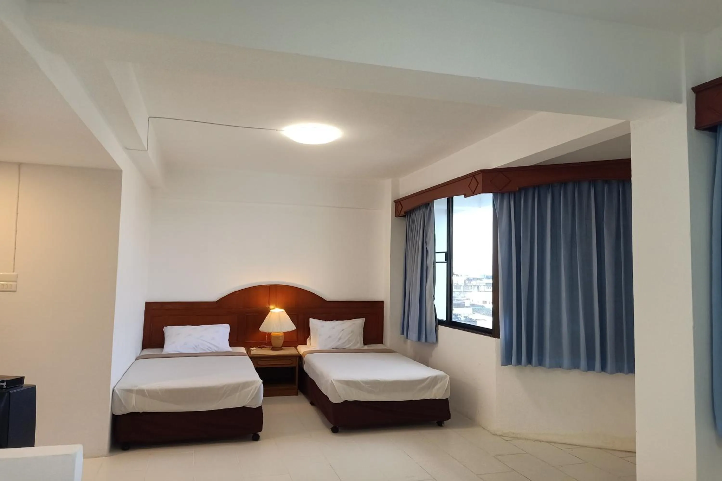 Bed in Phayao Northern Lake Hotel