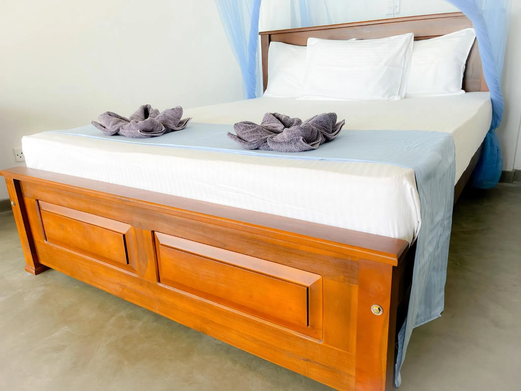 Bed in Pearl Island Beach Hotel