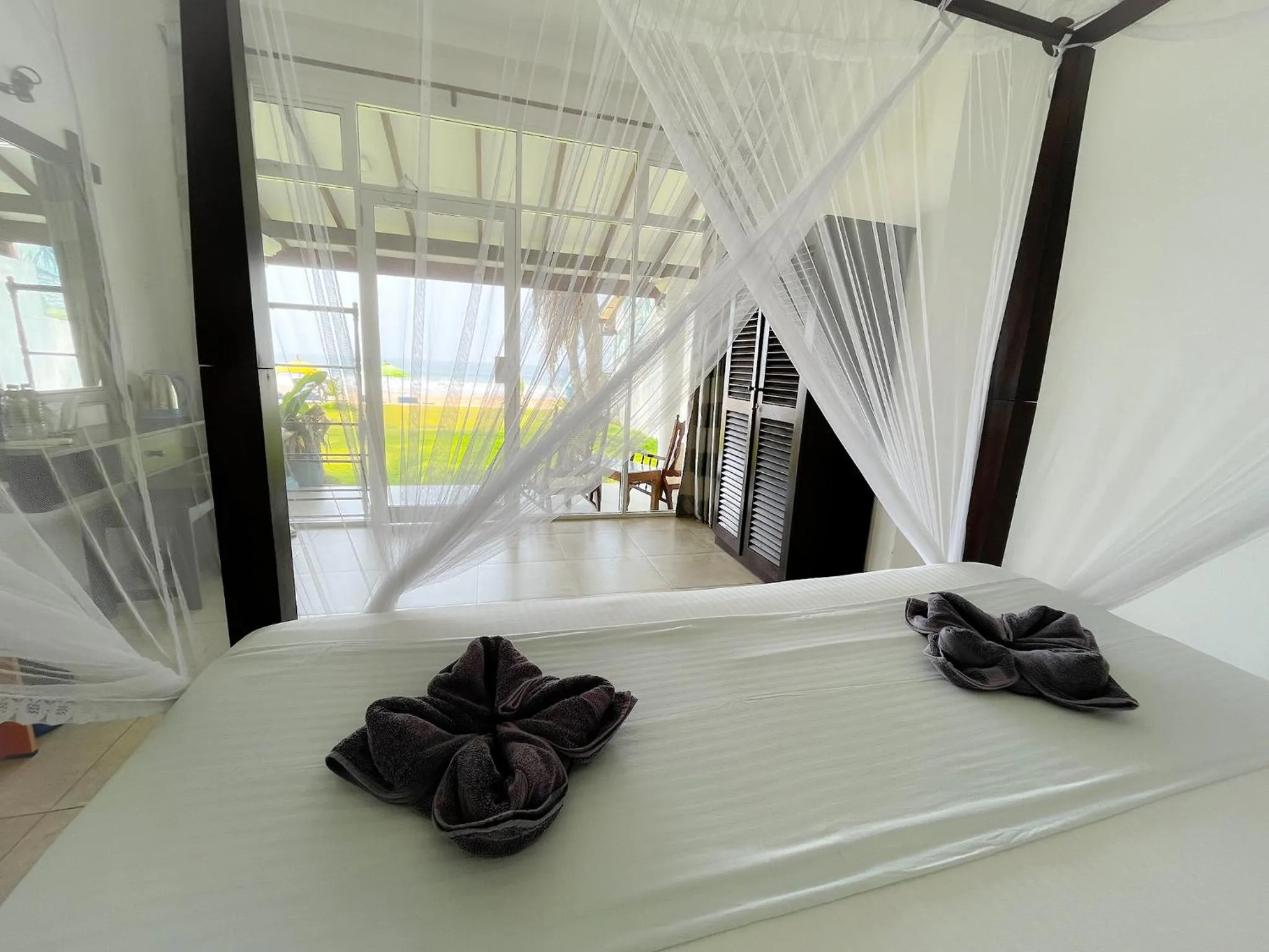 Bed in Pearl Island Beach Hotel