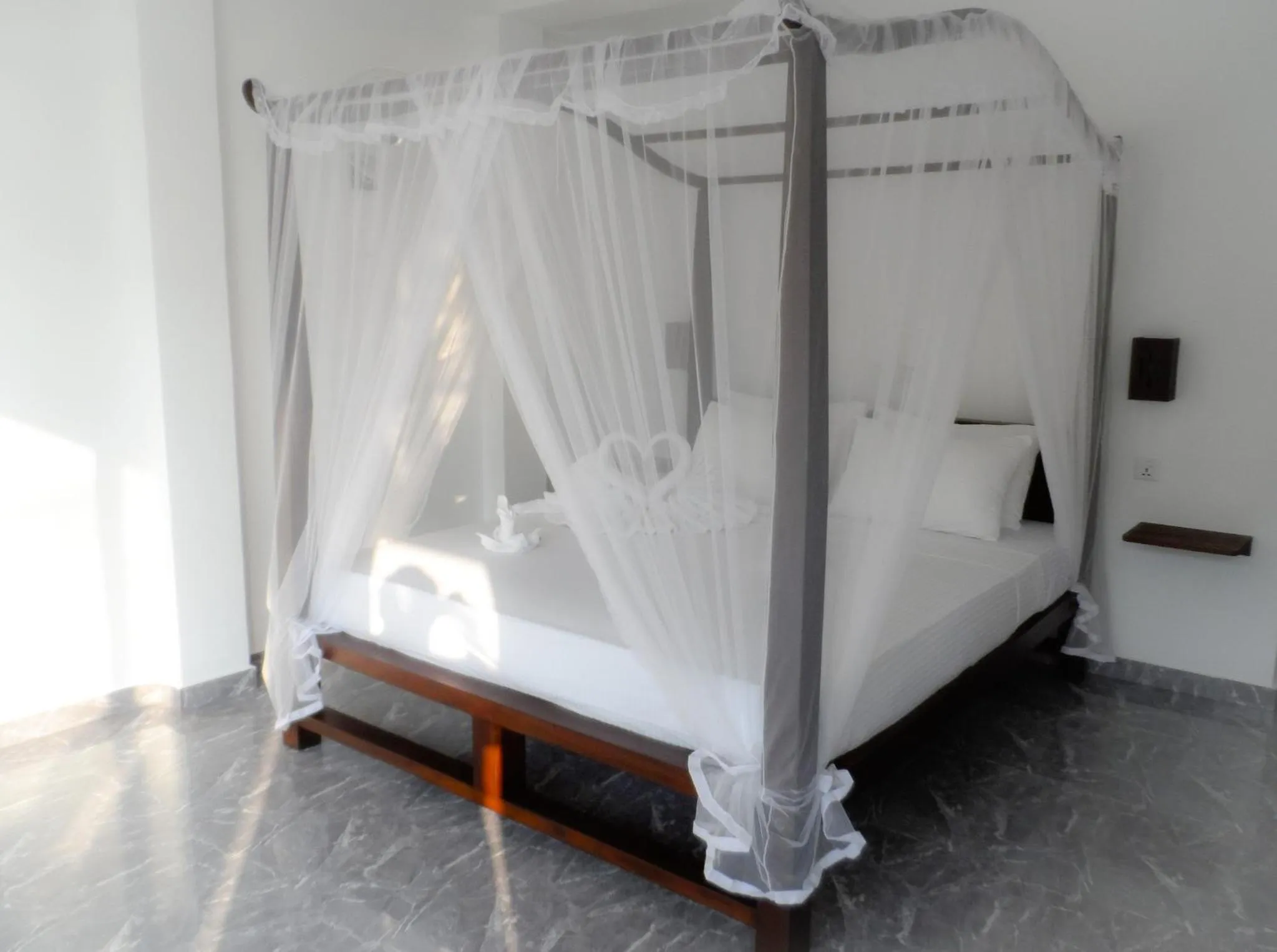 Bed in Pearl Island Beach Hotel