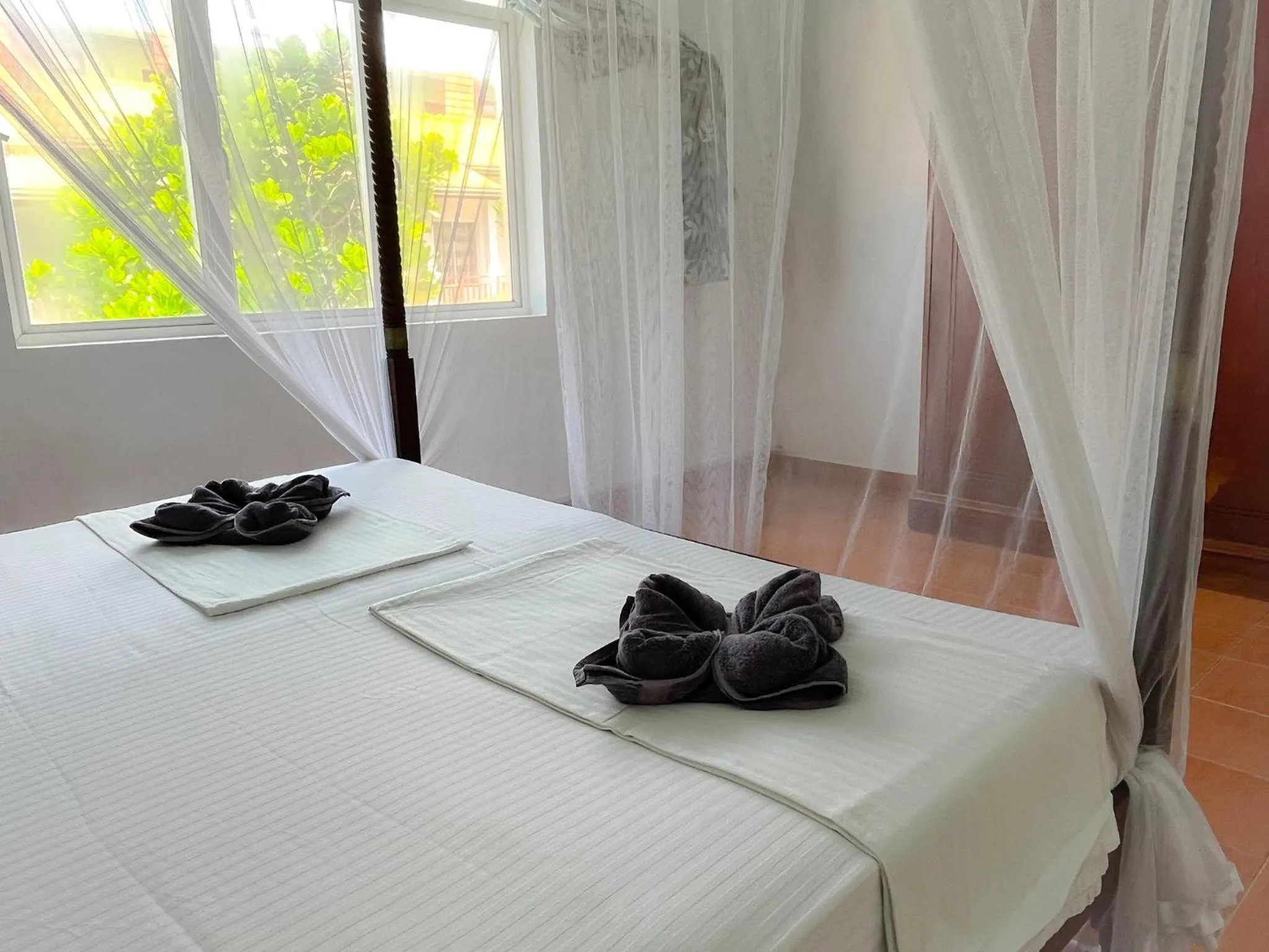 Photo of the whole room, Bed in Pearl Island Beach Hotel