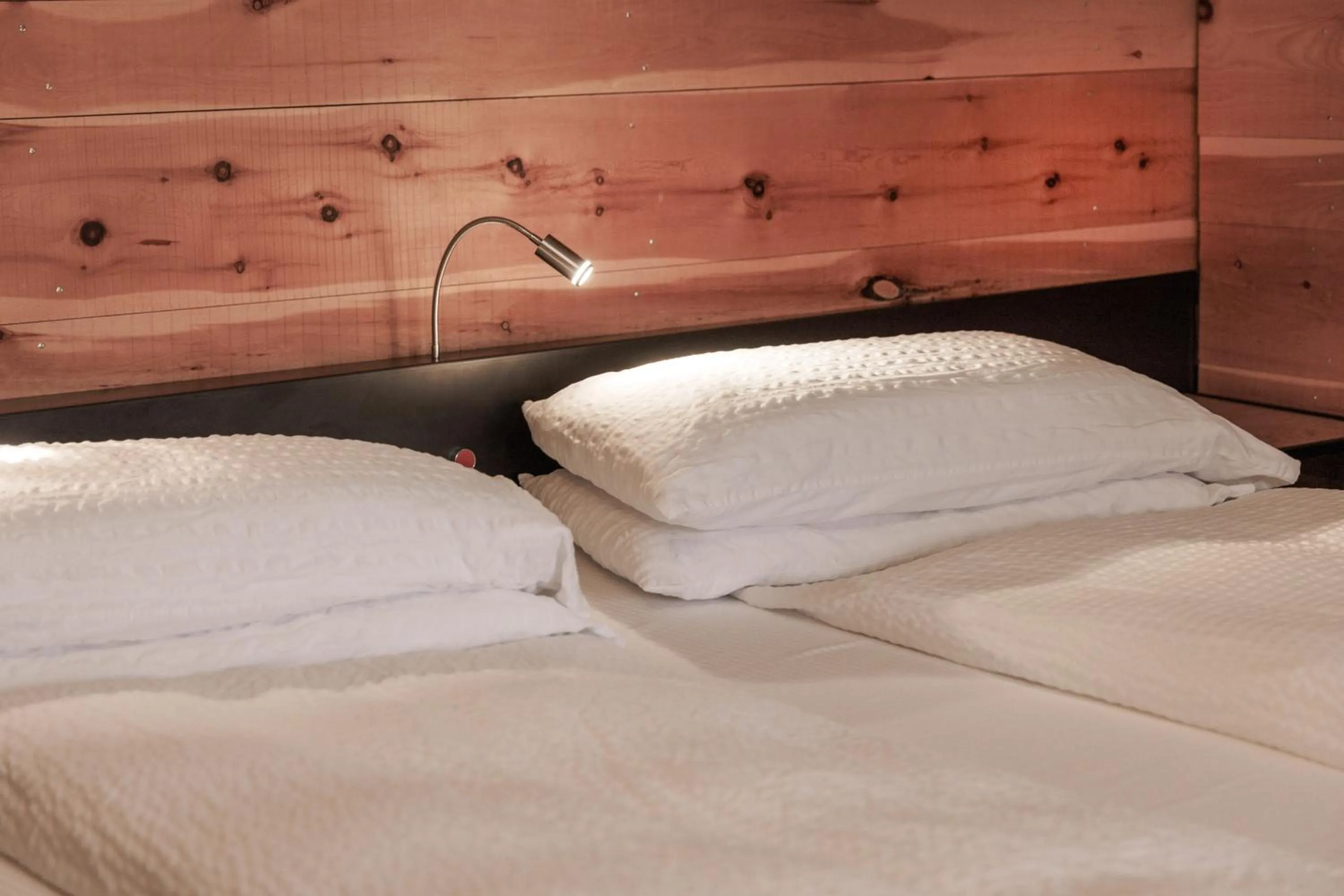 Bed in Ambienthotel PrimaLuna 3S