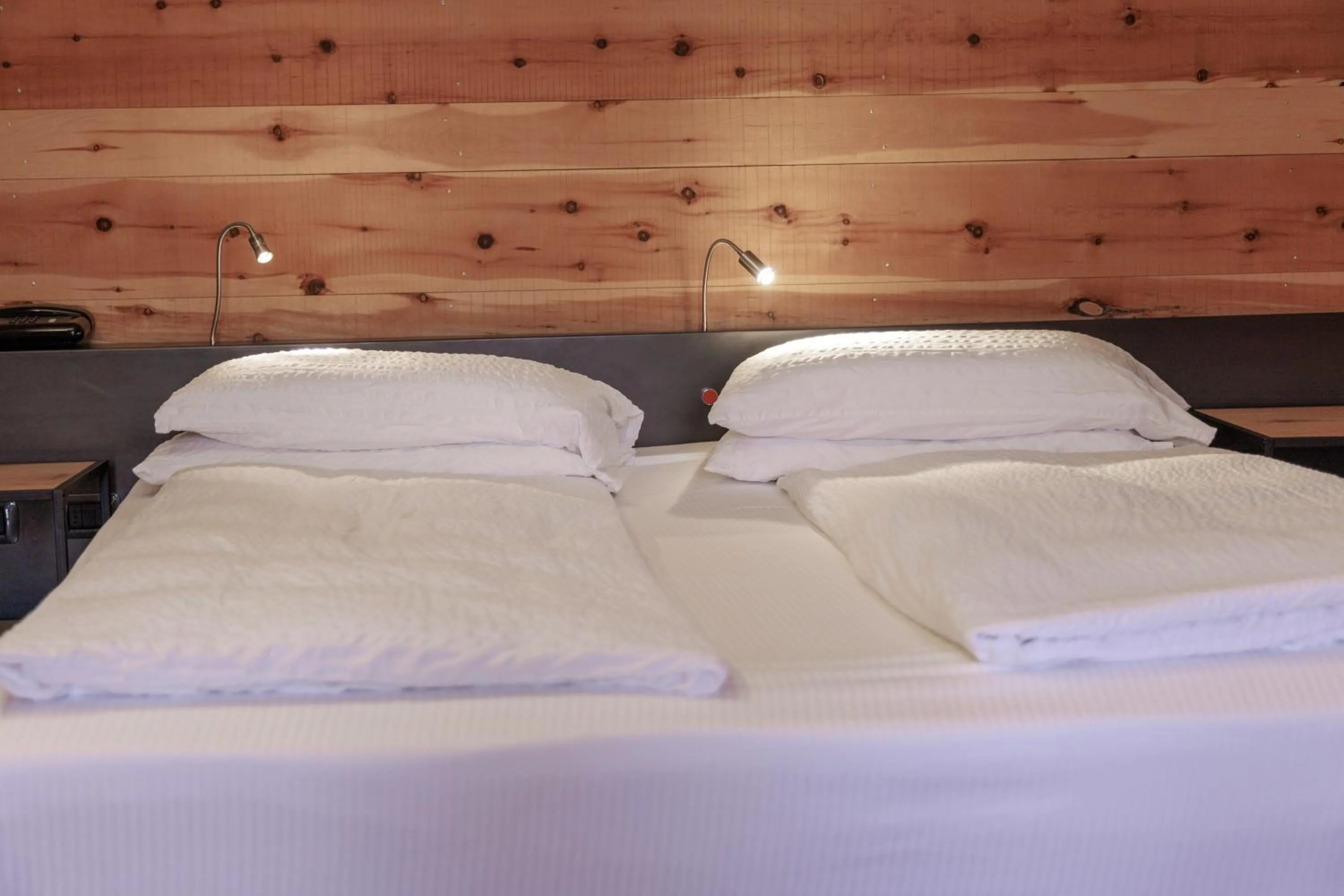 Bed in Ambienthotel PrimaLuna 3S