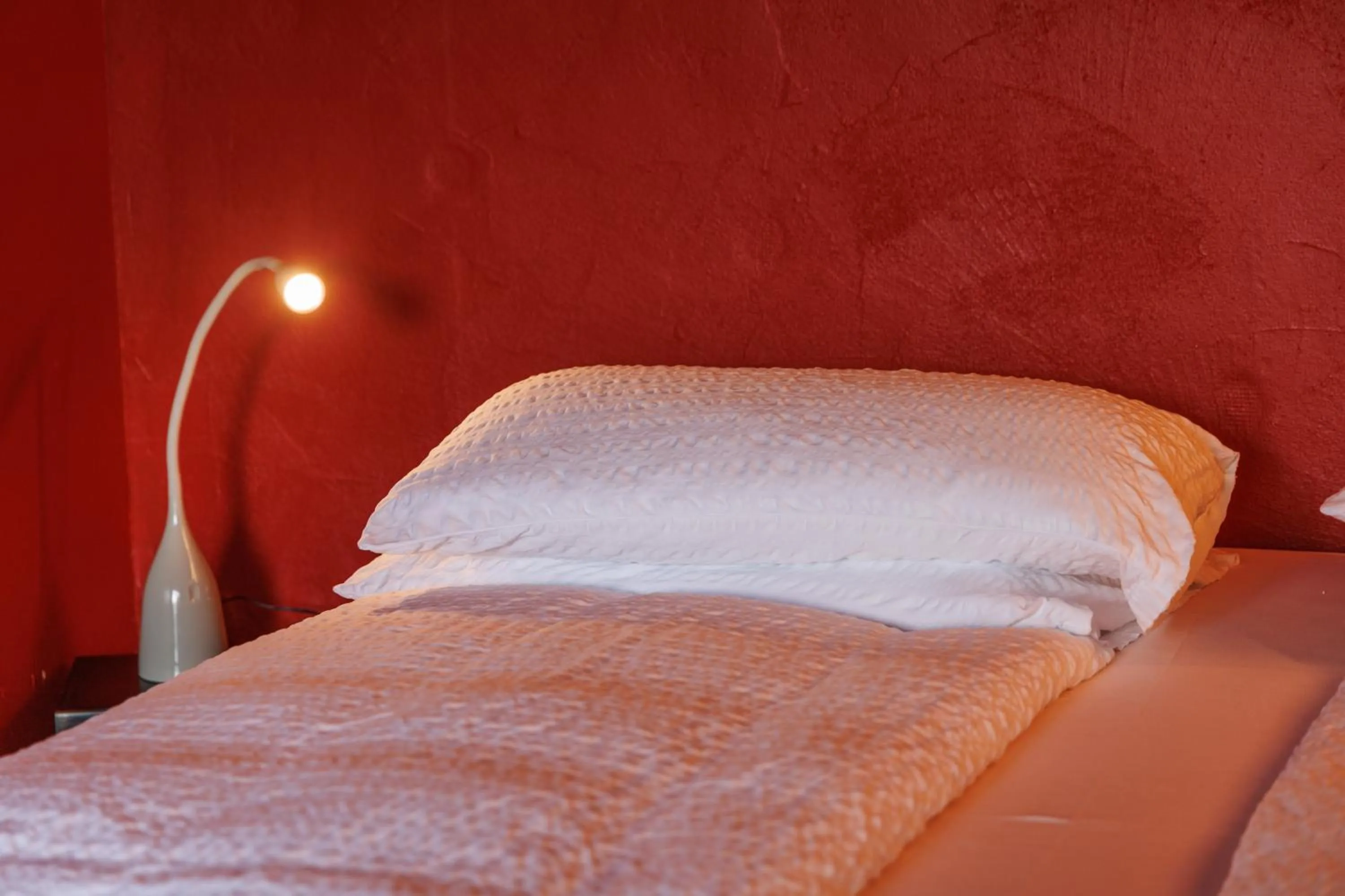 Bed in Ambienthotel PrimaLuna 3S