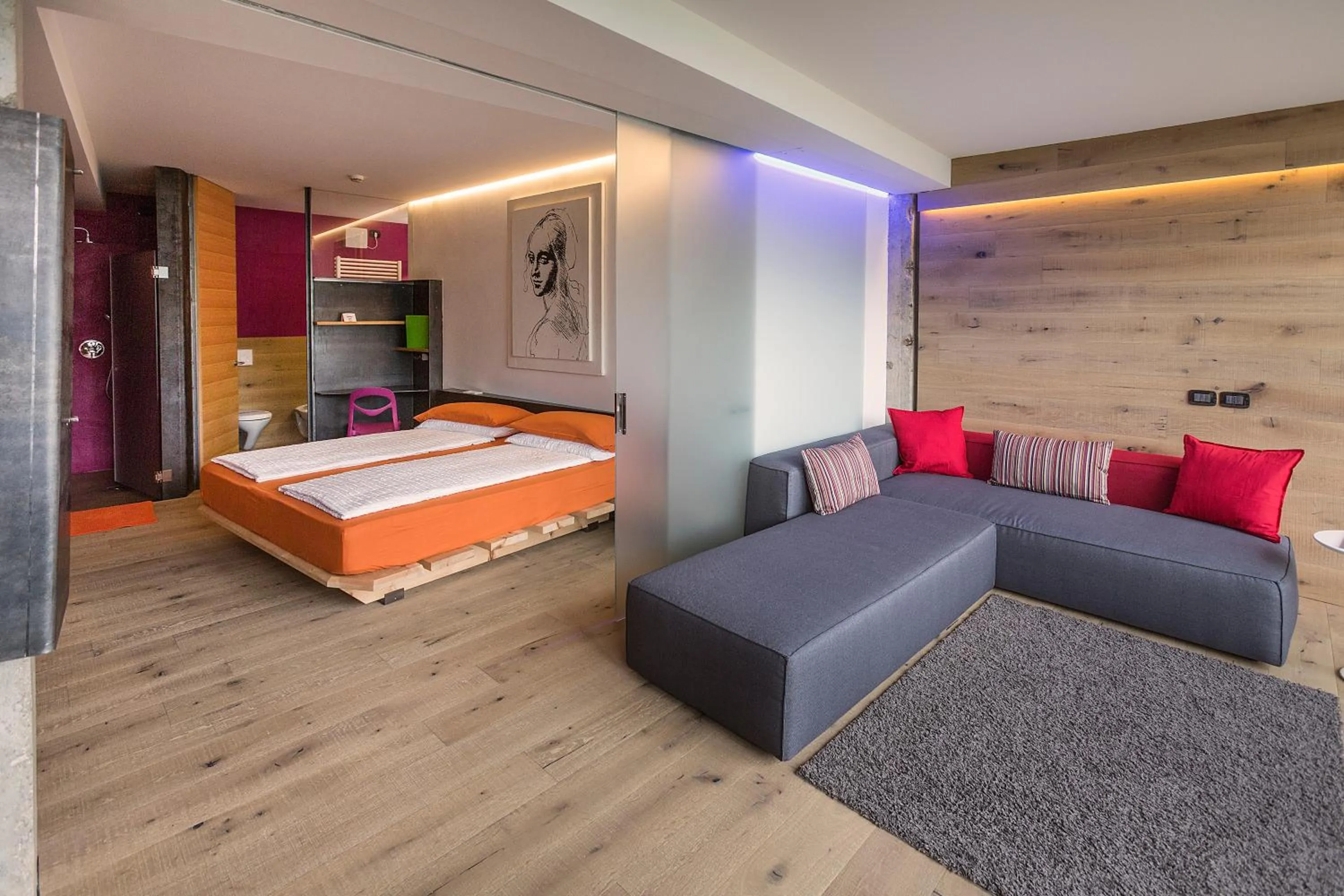 Living room, Bed in Ambienthotel PrimaLuna 3S