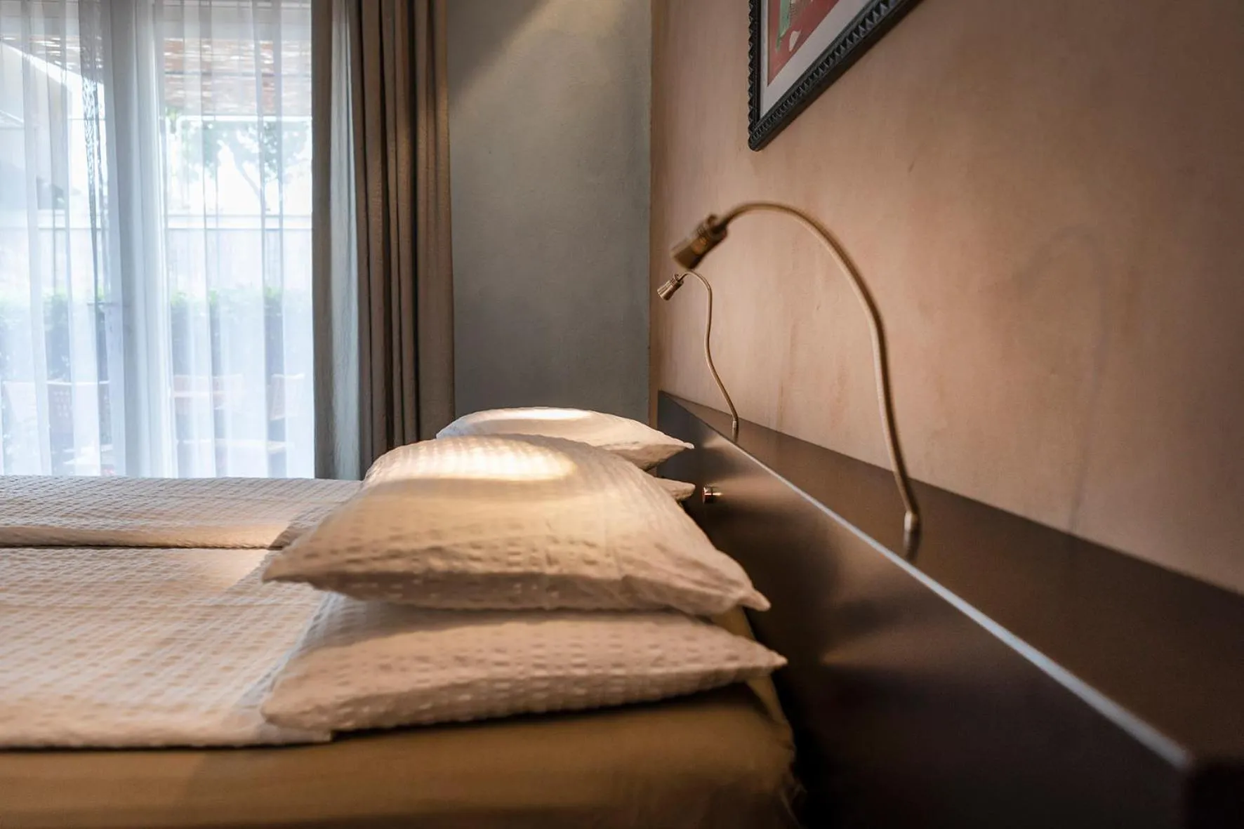 Bed in Ambienthotel PrimaLuna 3S