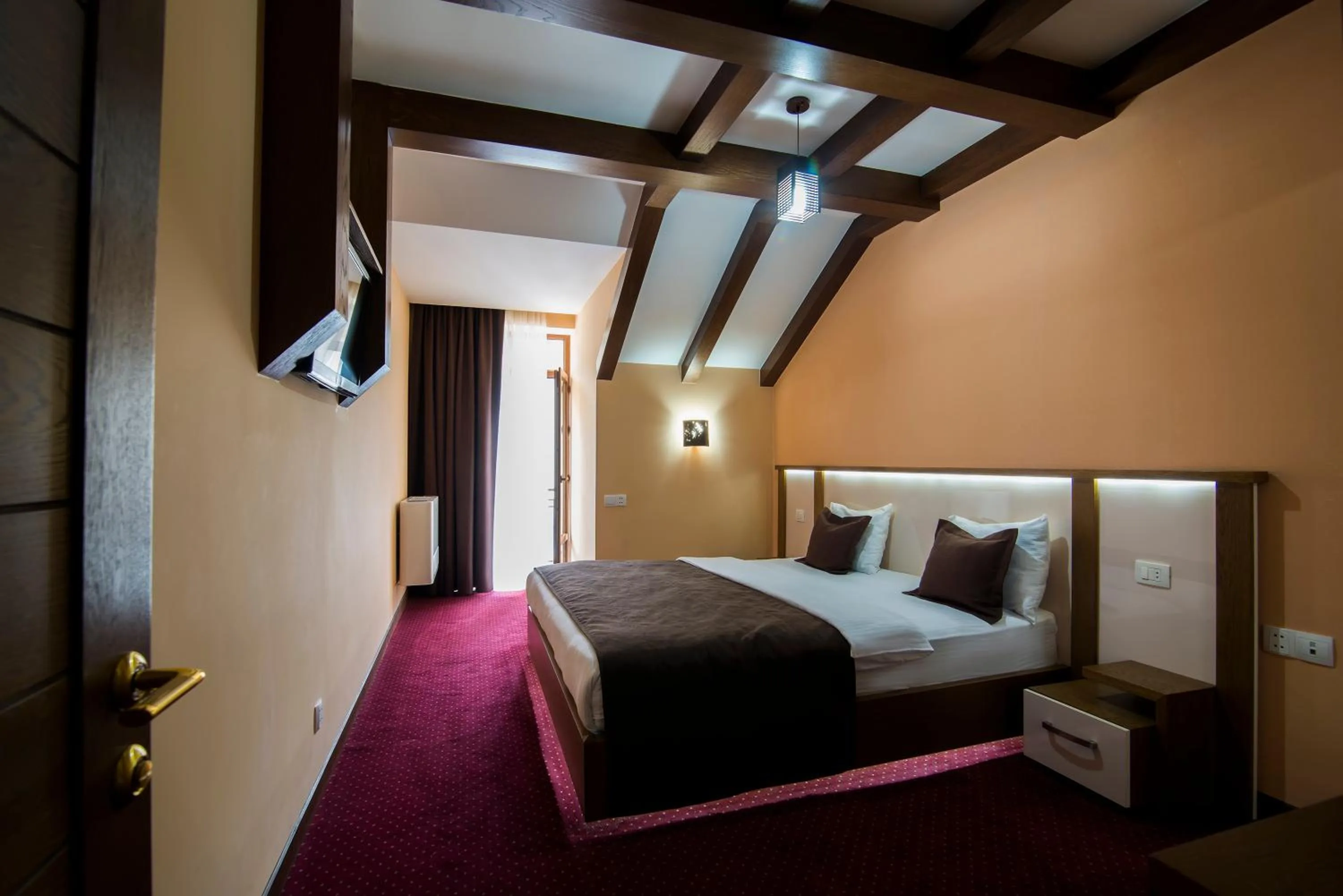 Bed in Elegant Hotel & Resort