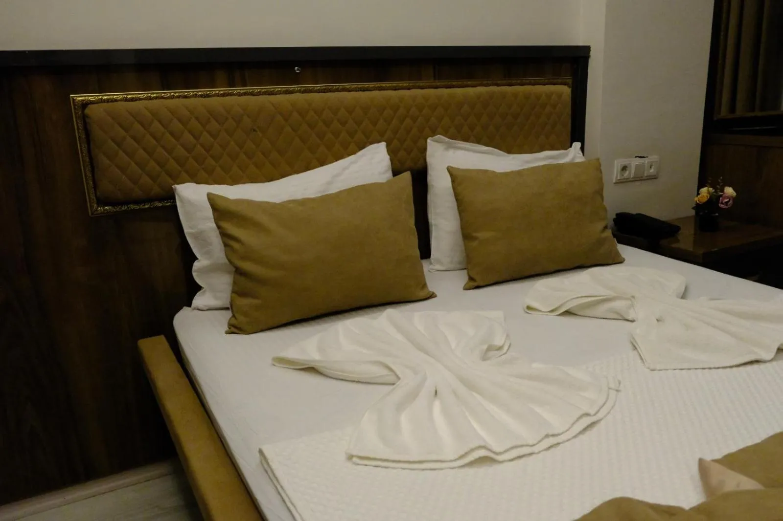 Bed in Grand Diamond Hotel