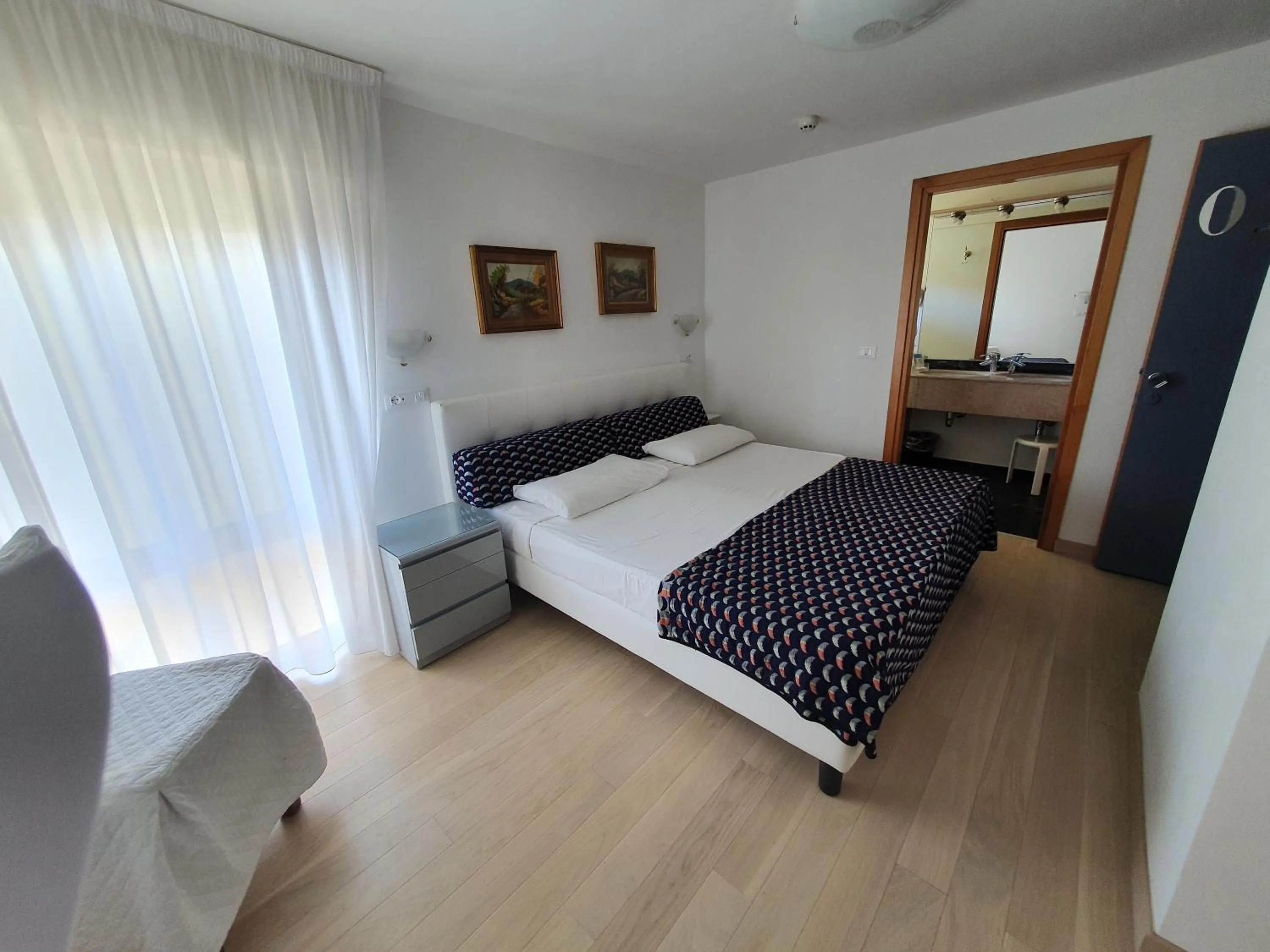 Bed in Hotel Cavallino Bianco