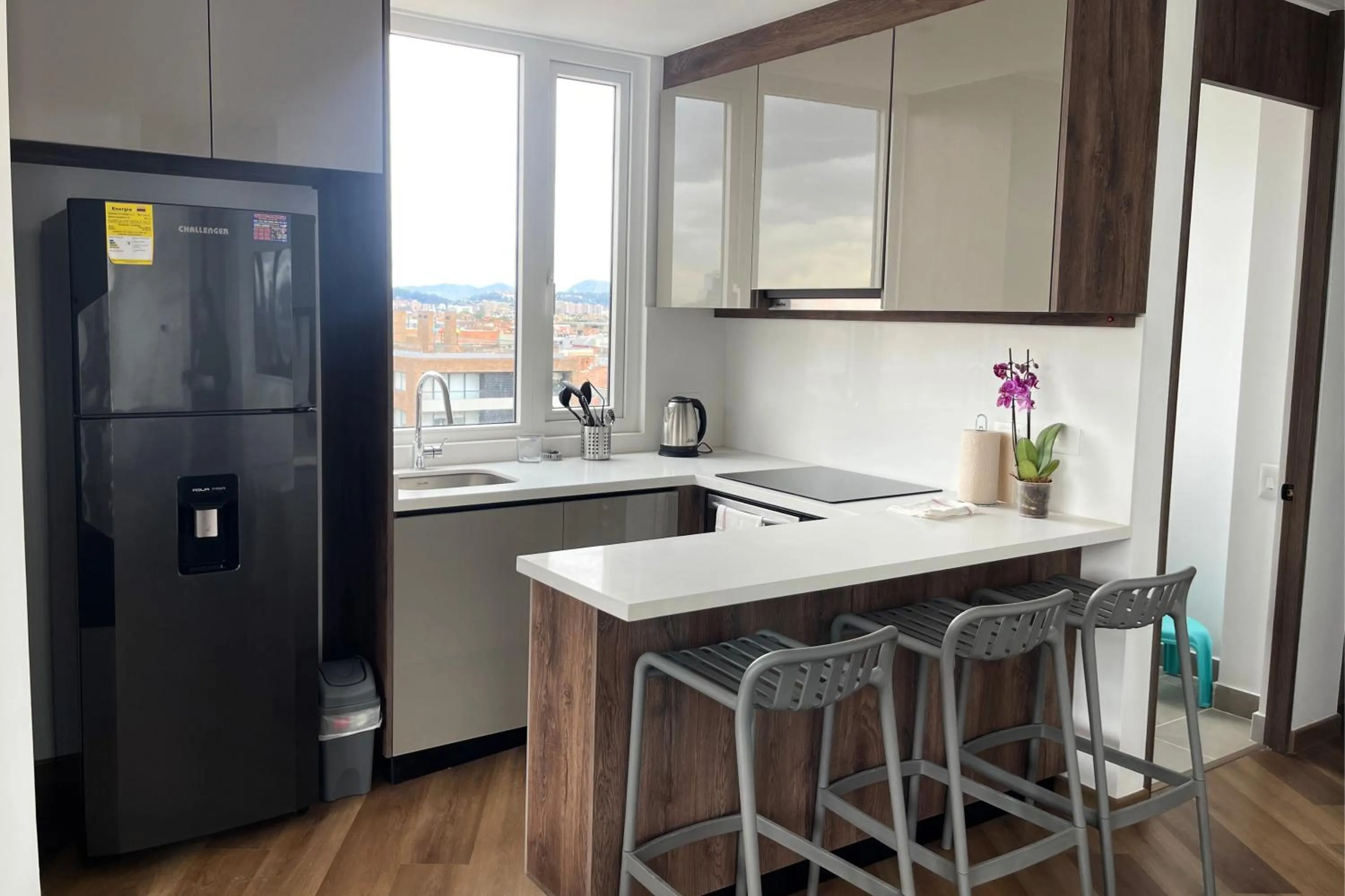 Kitchen or kitchenette in VOU Suites by Avia Suites