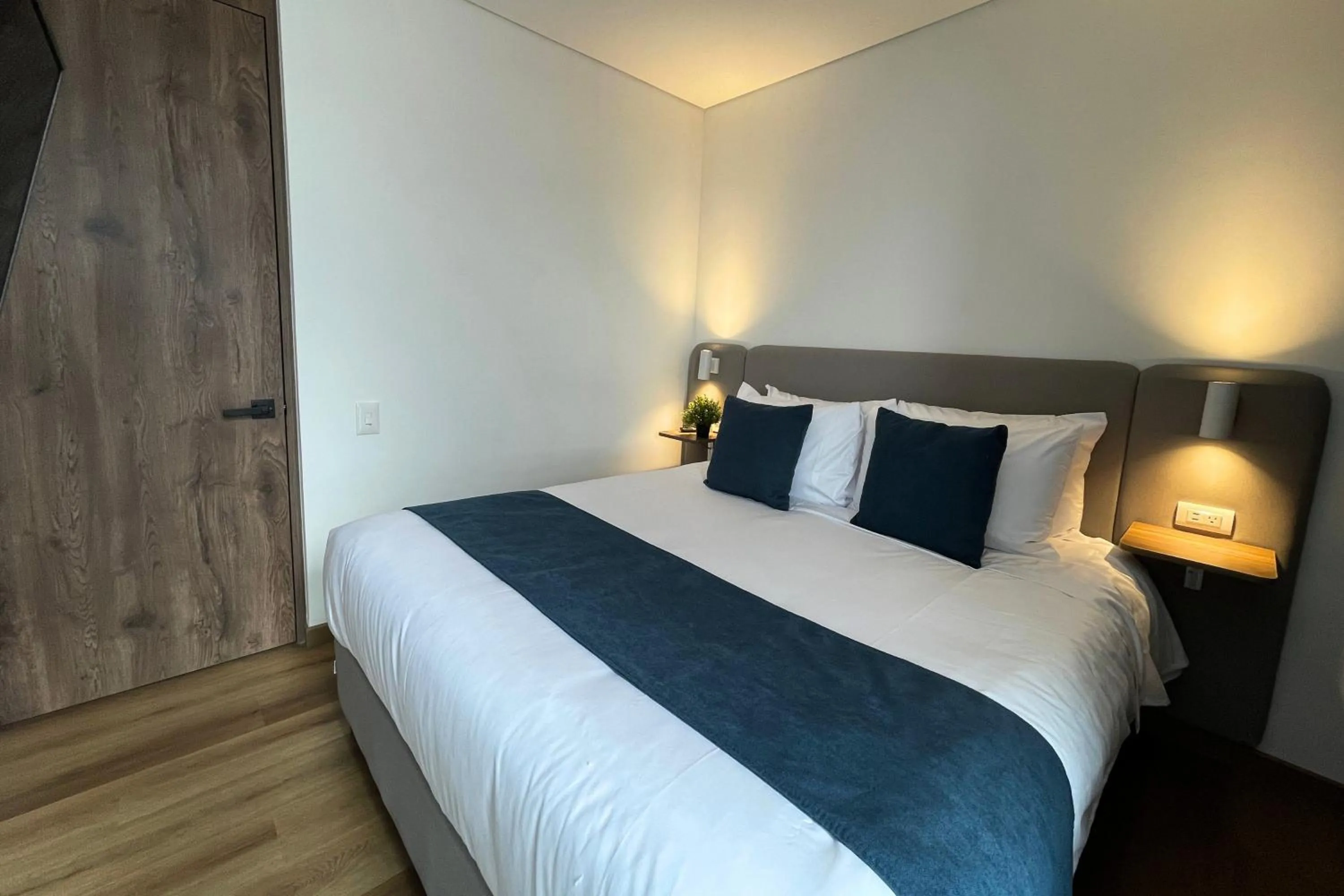 wardrobe, Bed in VOU Suites by Avia Suites