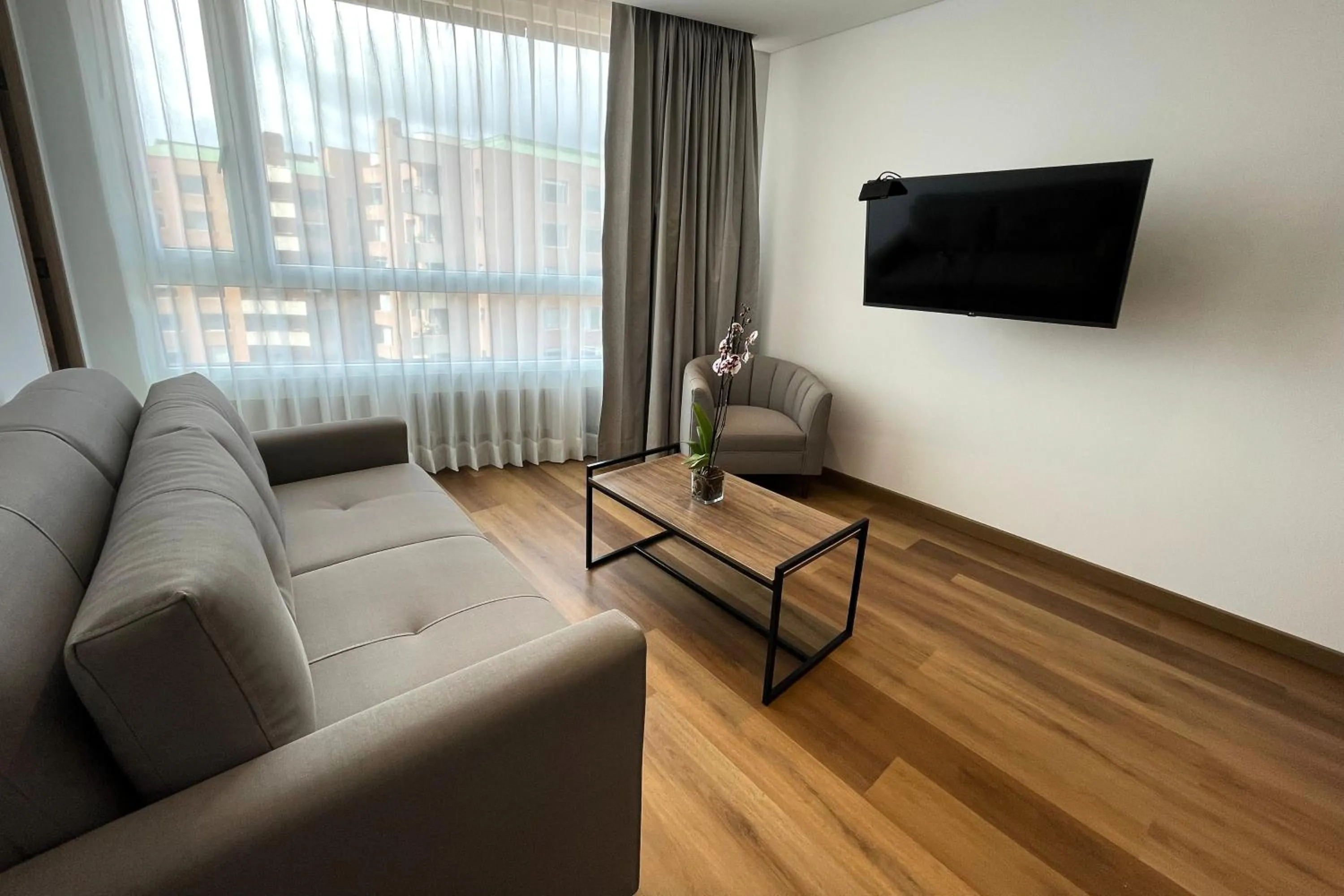 Living room in VOU Suites by Avia Suites