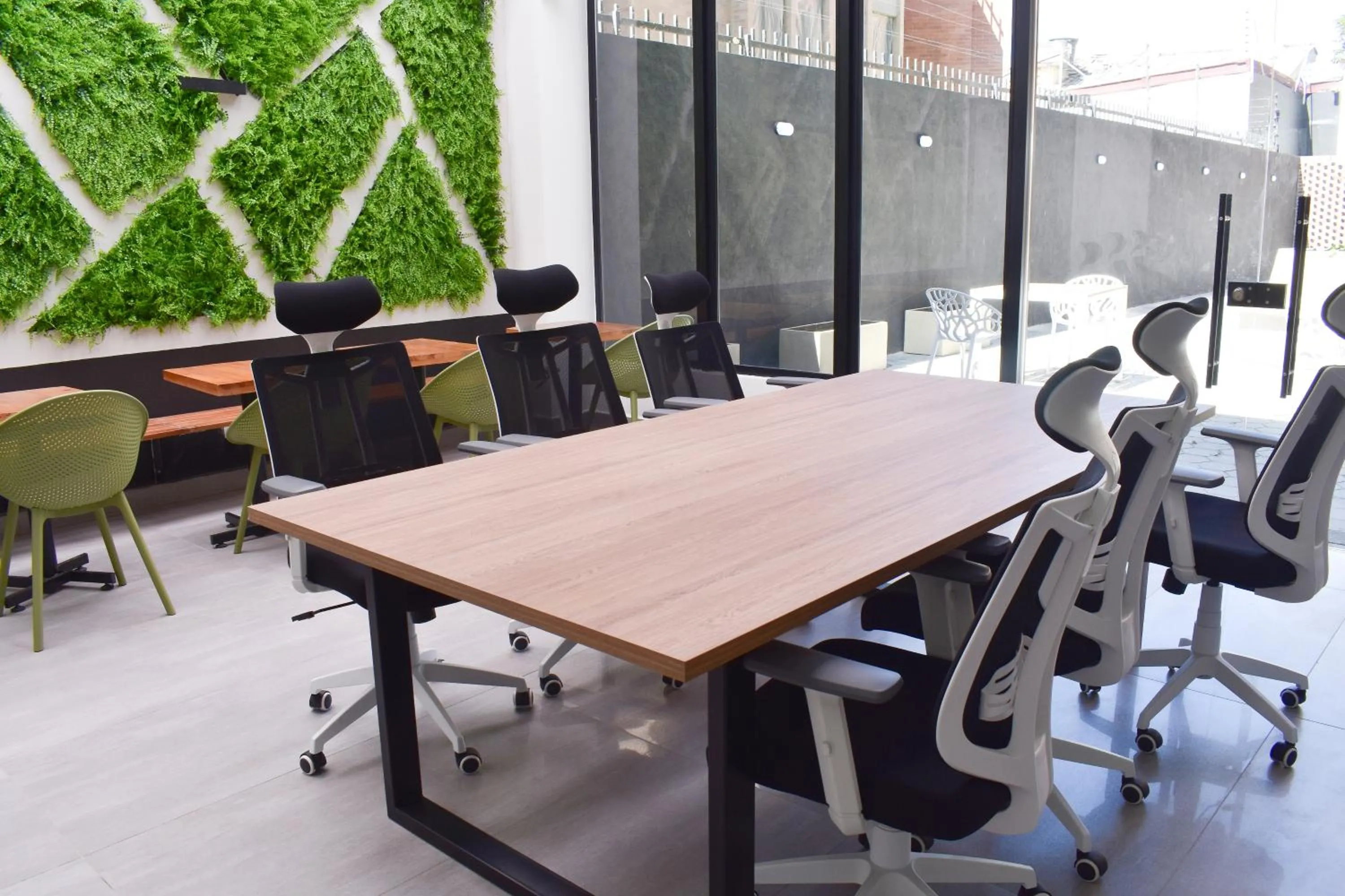 Meeting/conference room in VOU Suites by Avia Suites